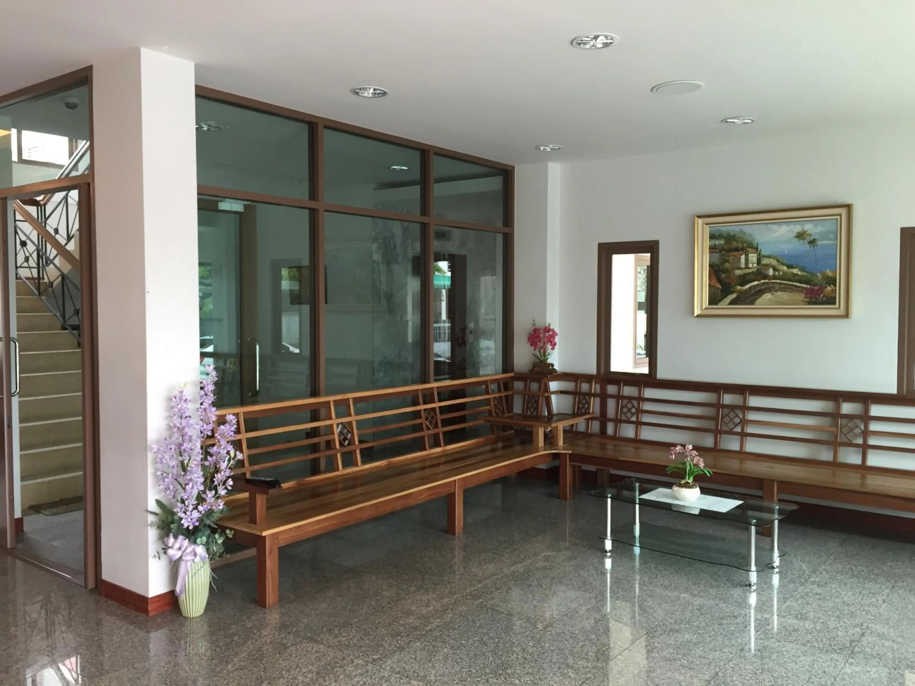 Lobby or reception in Orchid Residence Suratthani