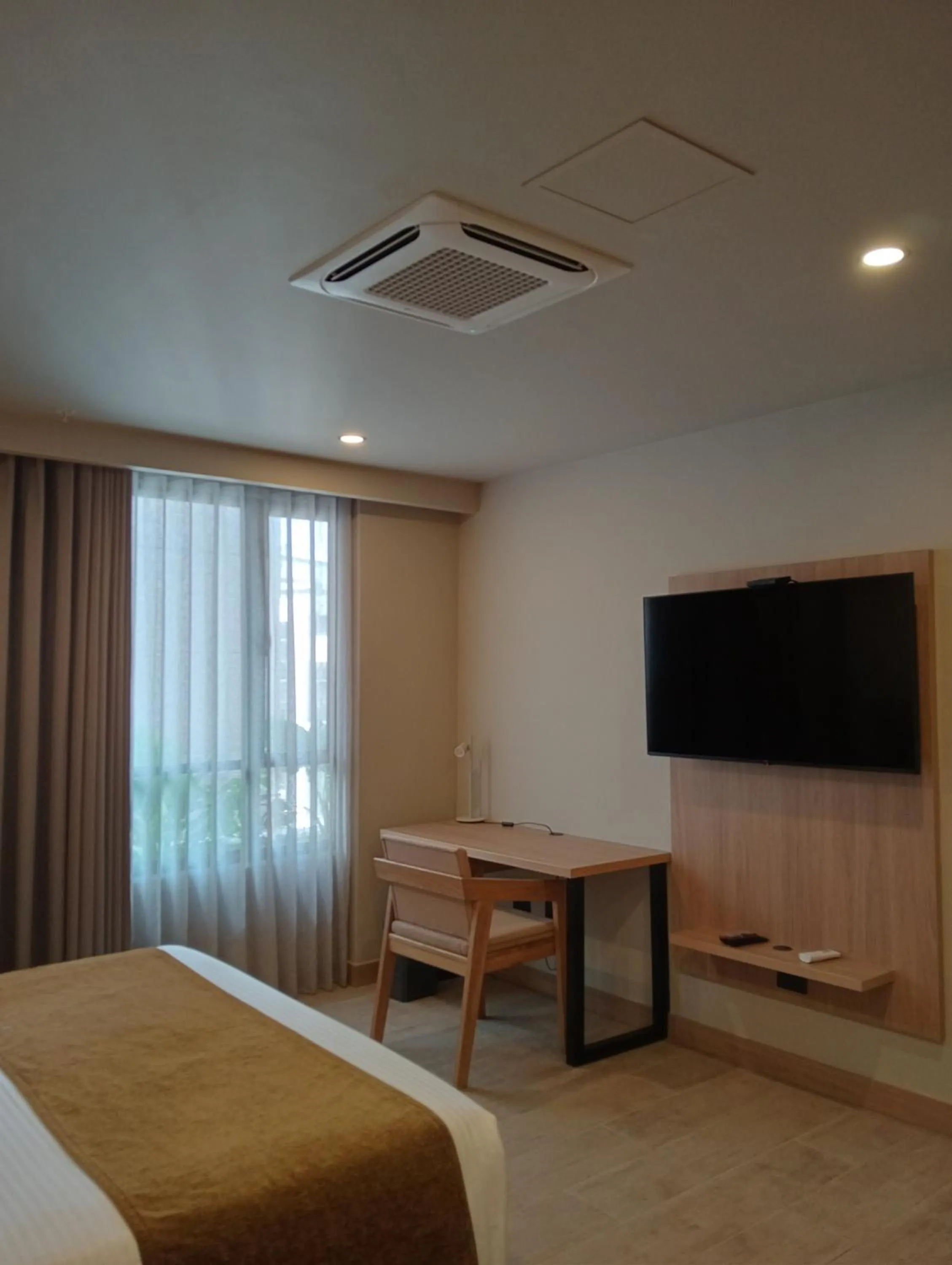 air conditioner, Bed in Hotel Rulay Medellin