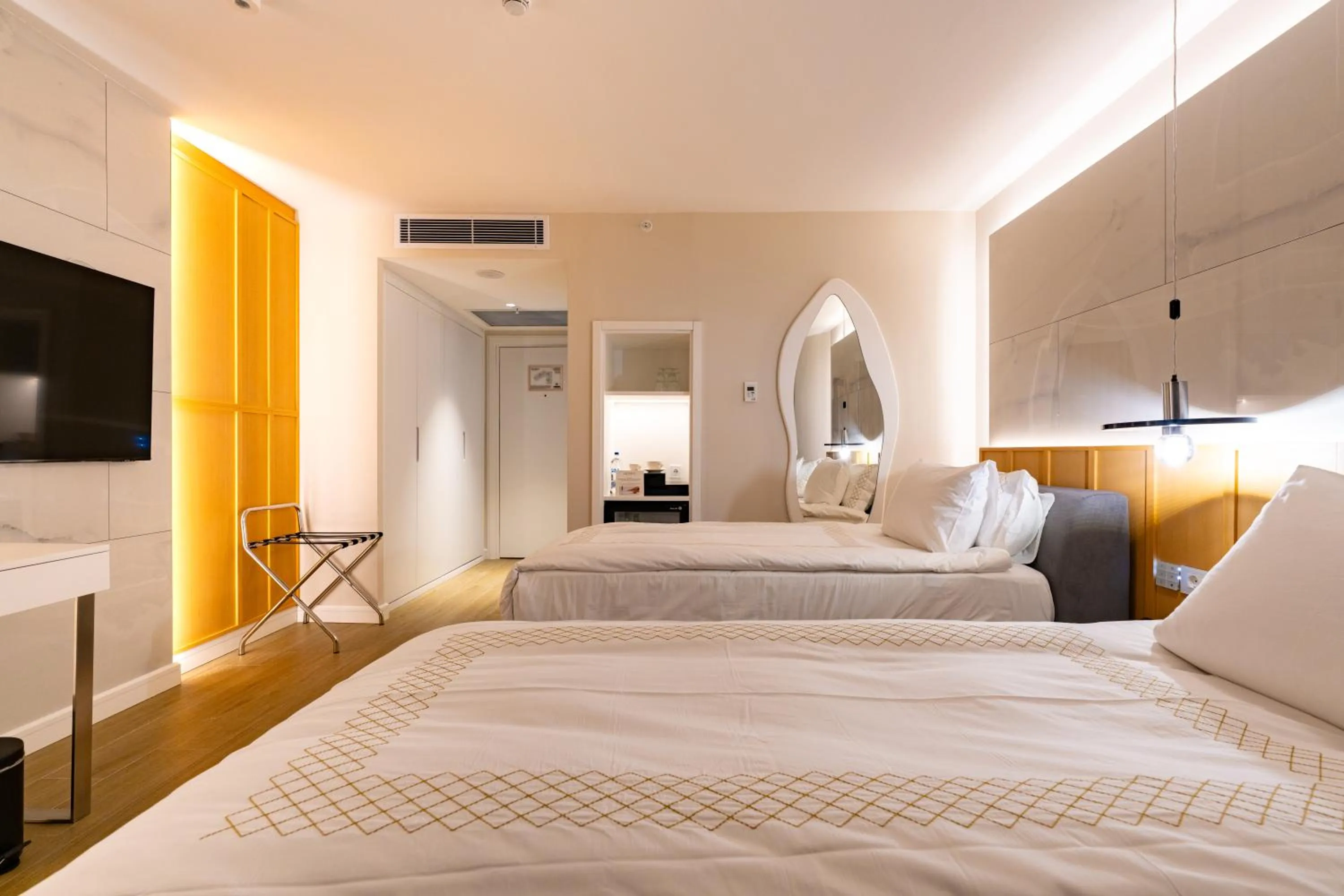 Bed in Qlusive Hotel