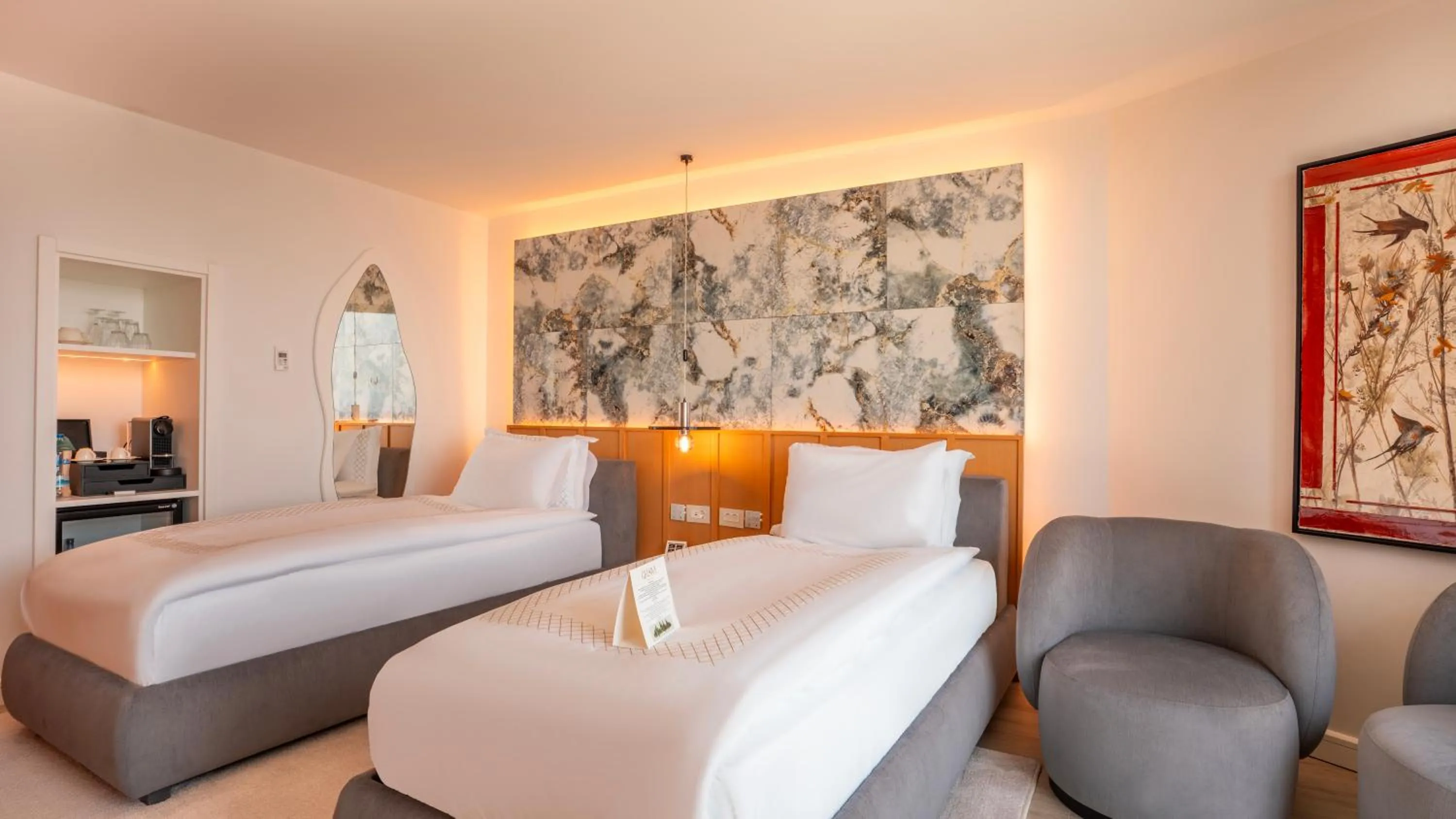 Bed in Qlusive Hotel