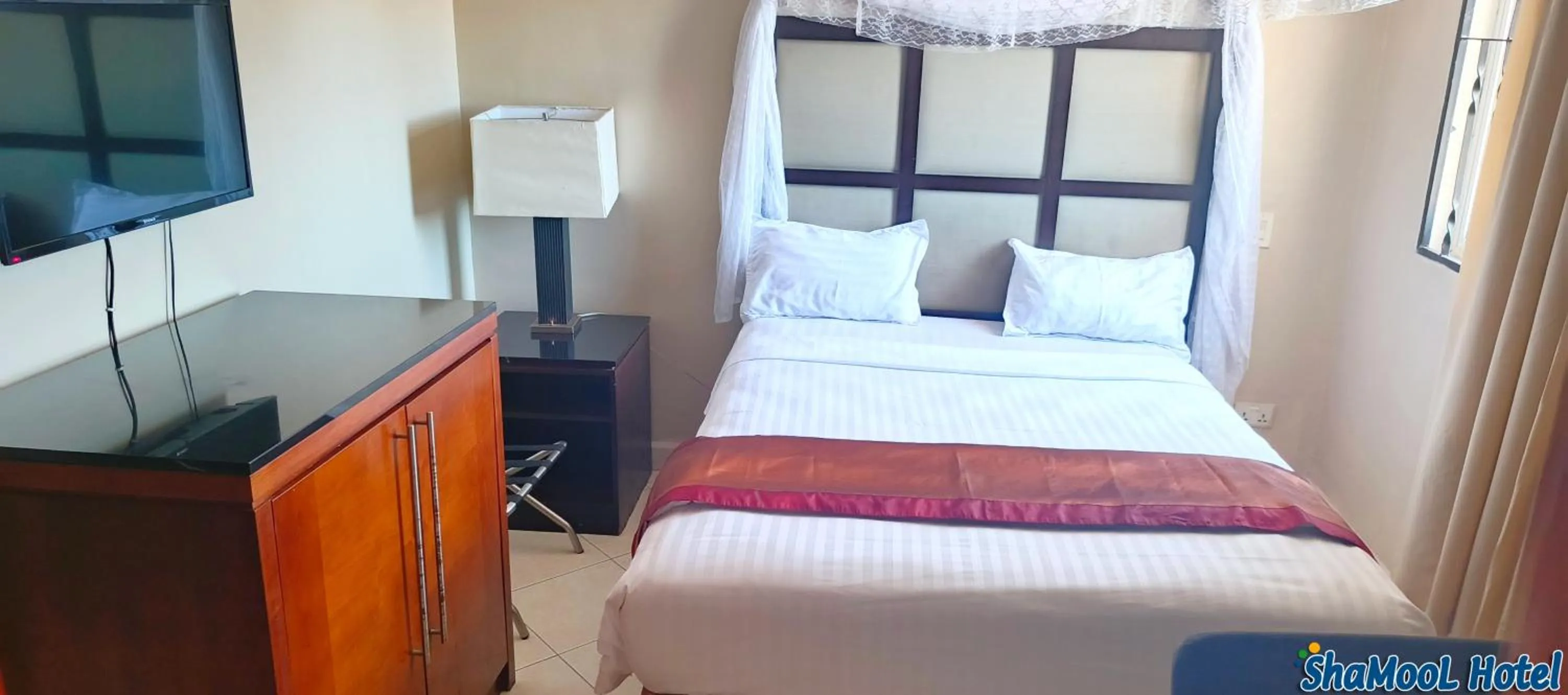 Bed in ShaMooL Hotel