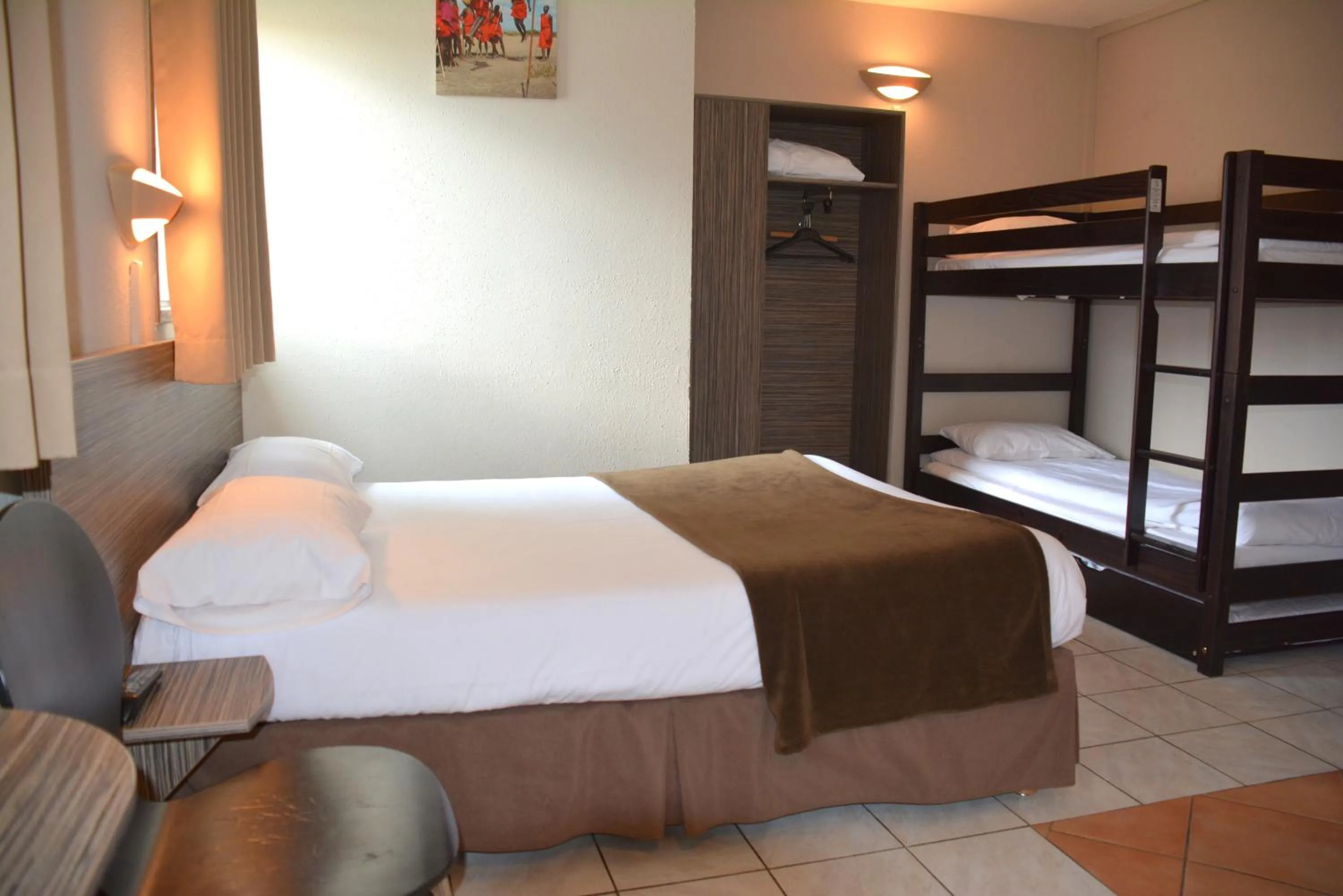 Bedroom in Hôtel Le Floreal