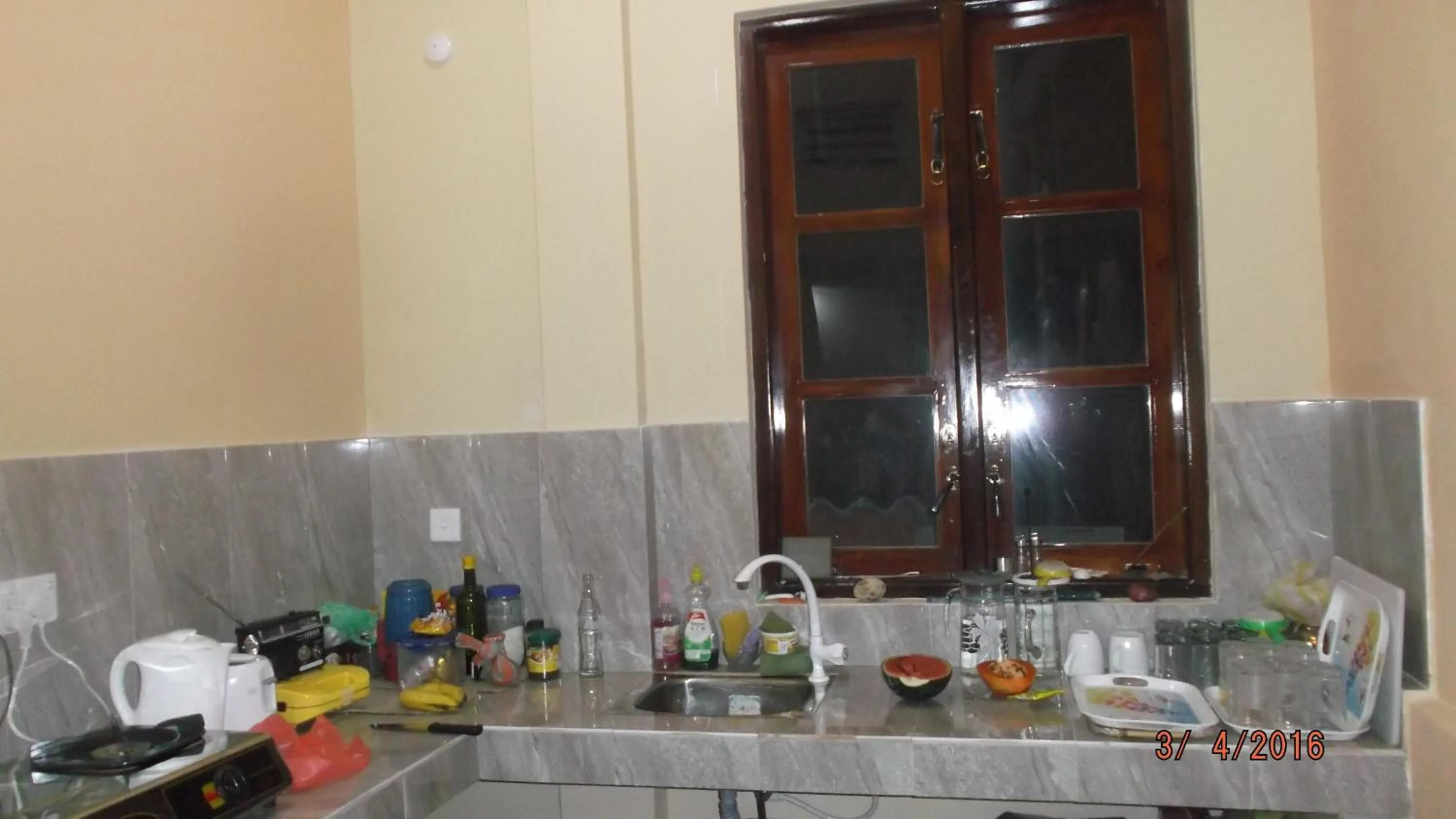 Kitchen or kitchenette in Anura Guest Inn