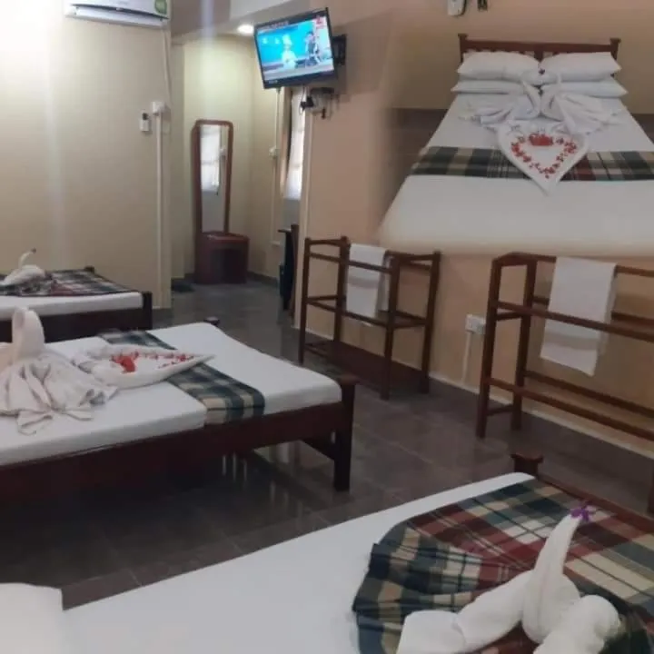 Bed in Anura Guest Inn