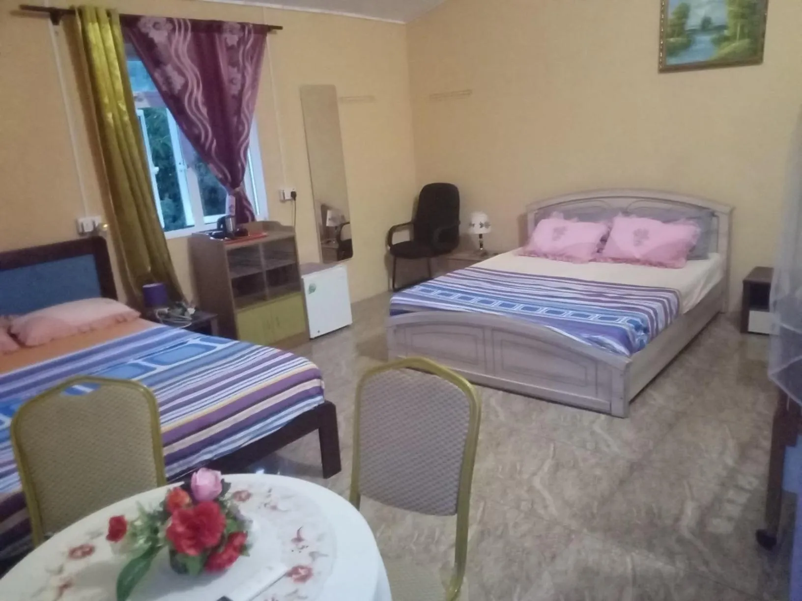 Bed in Chez Ronald Guest House