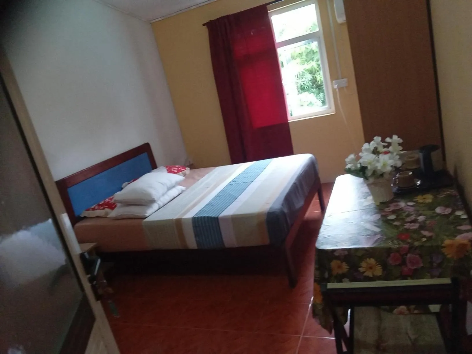 Bedroom in Chez Ronald Guest House