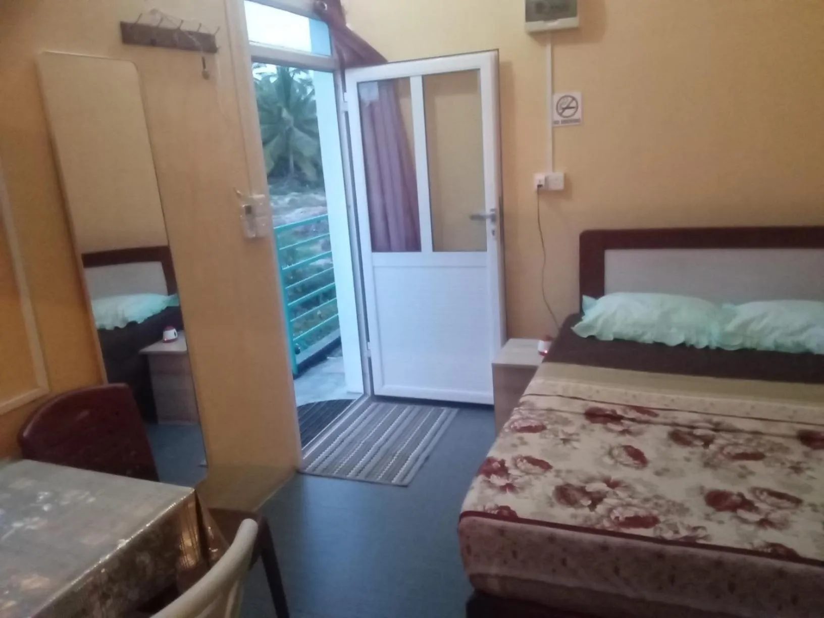 Bed in Chez Ronald Guest House