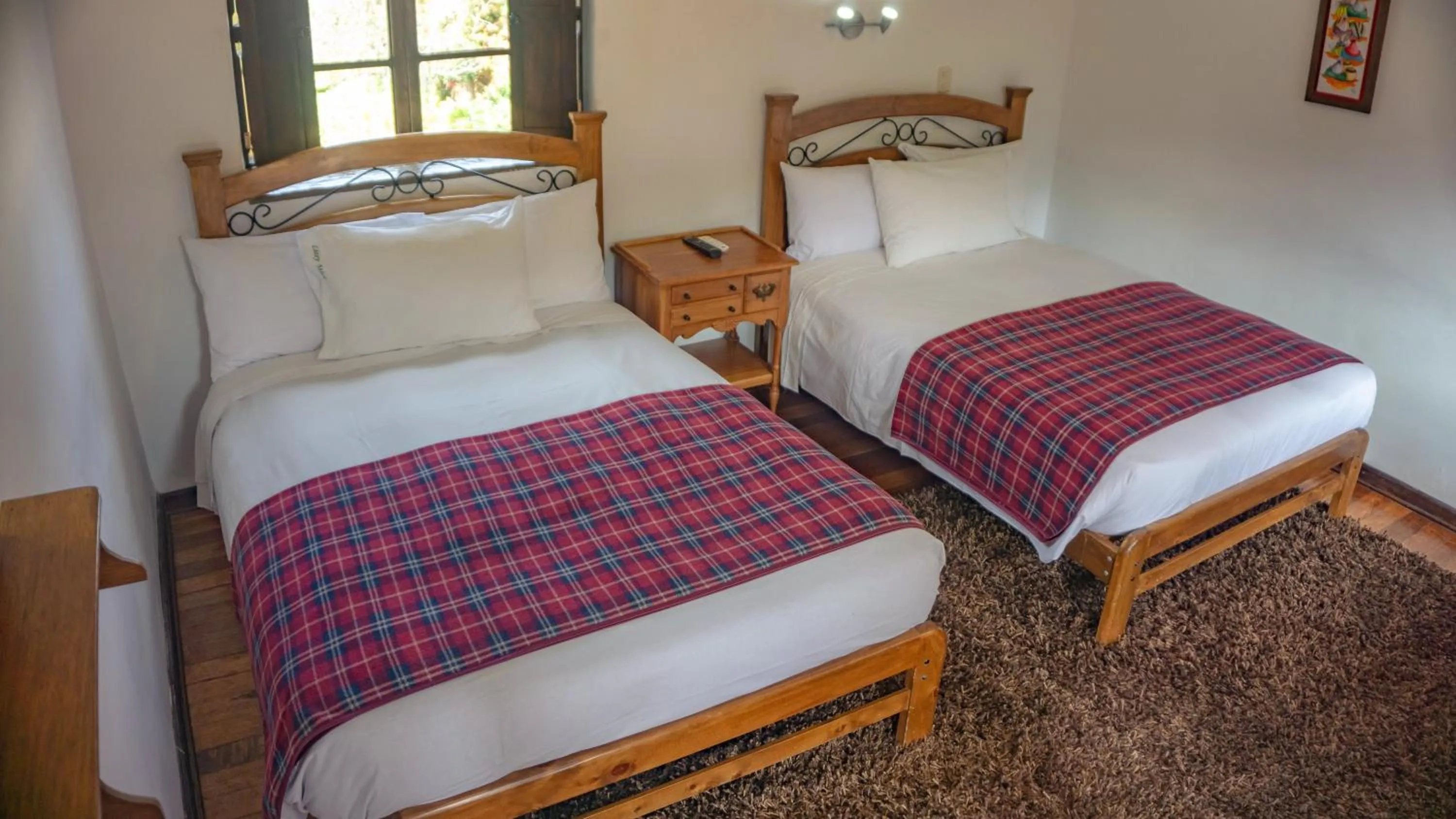 Photo of the whole room, Bed in Lizzy Wasi Urubamba