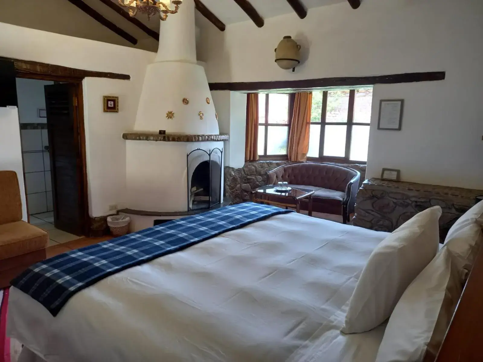 Seating area, Bed in Lizzy Wasi Urubamba Seating area, Bed in Lizzy Wasi Urubamba