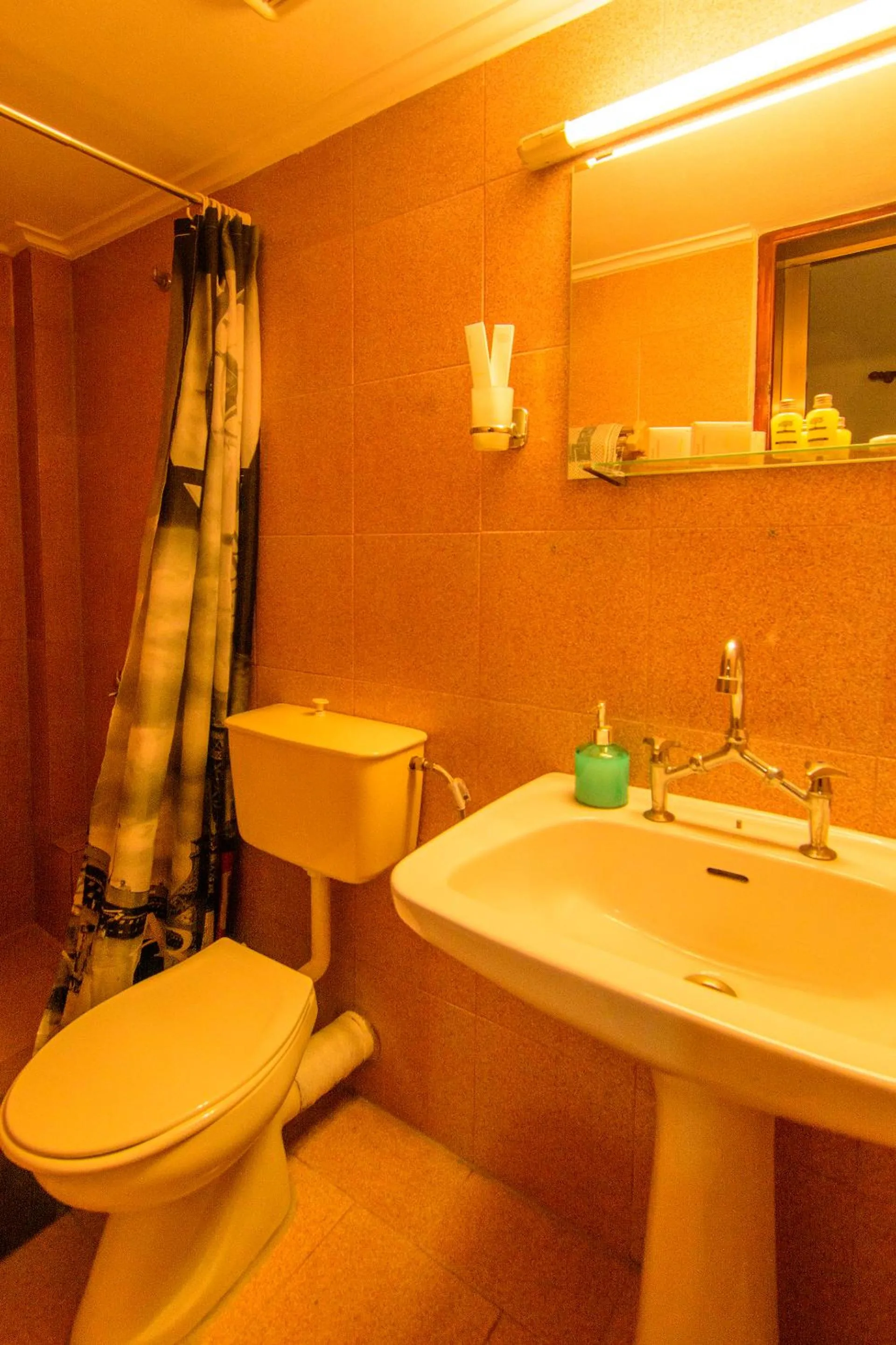 Bathroom in Savas Rooms