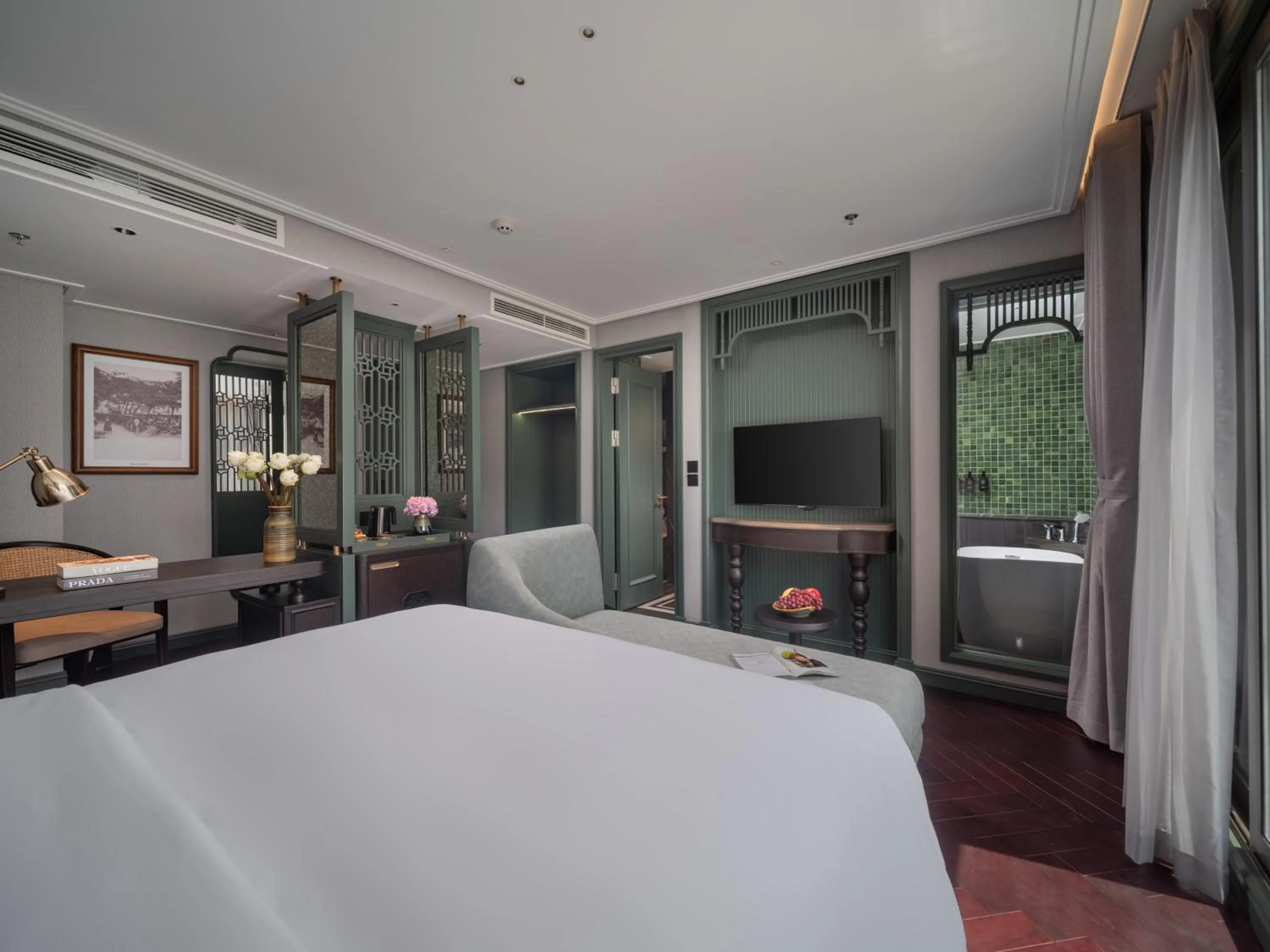 Communal lounge/ TV room, Bed in Tonkin Luxury Boutique Hotel & Spa