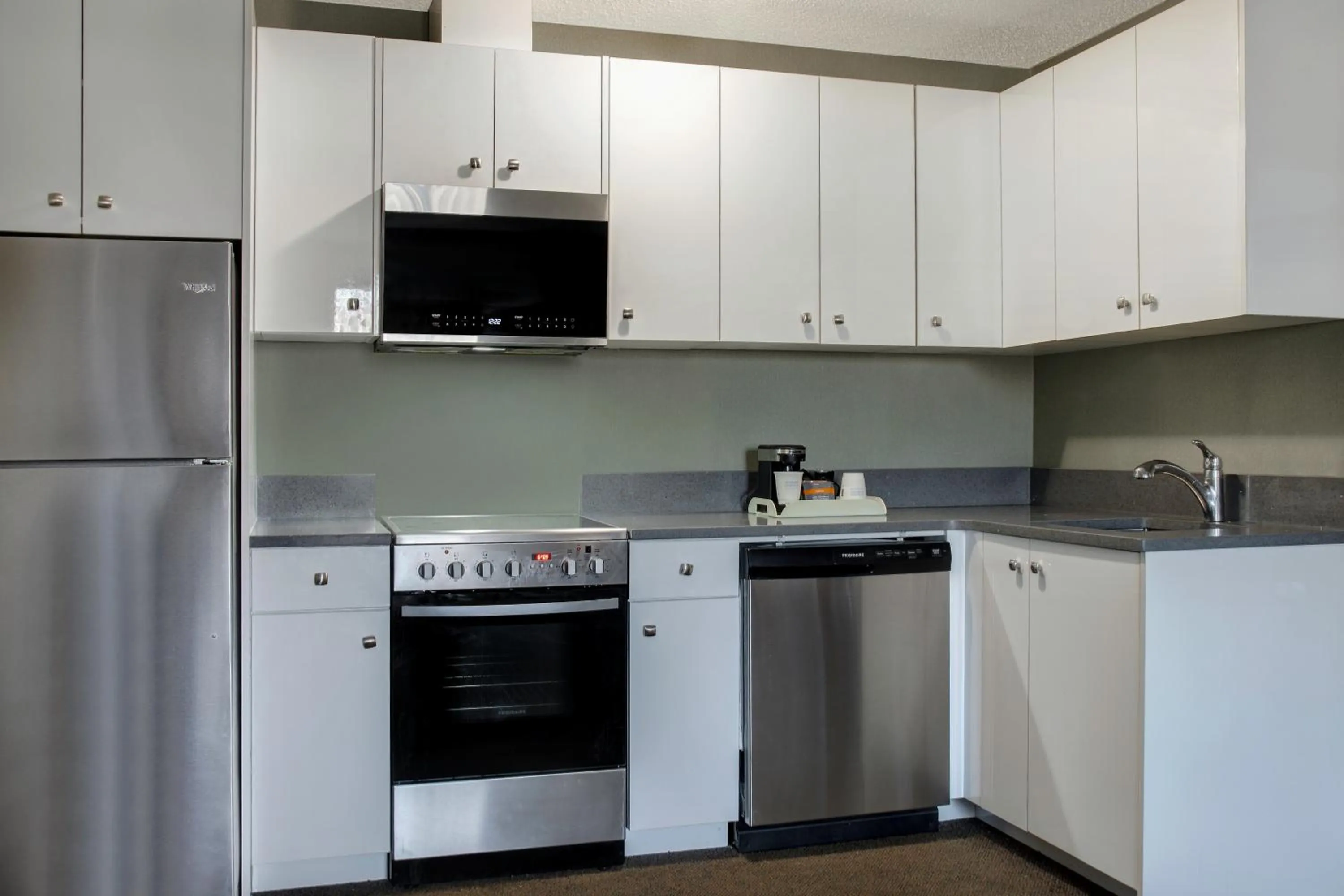 kitchen in Days Inn by Wyndham Whitecourt