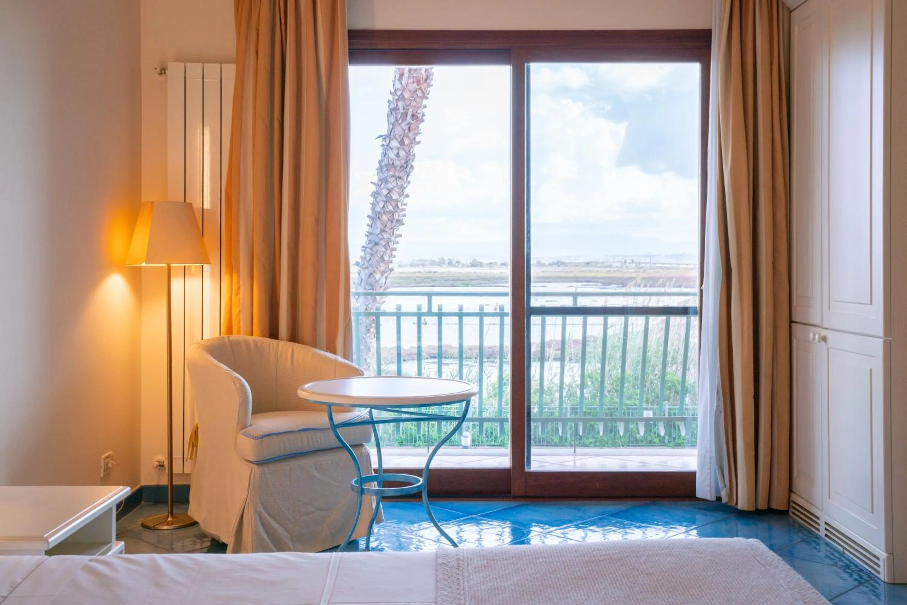 View (from property/room), Bed in Hotel Santa Gilla