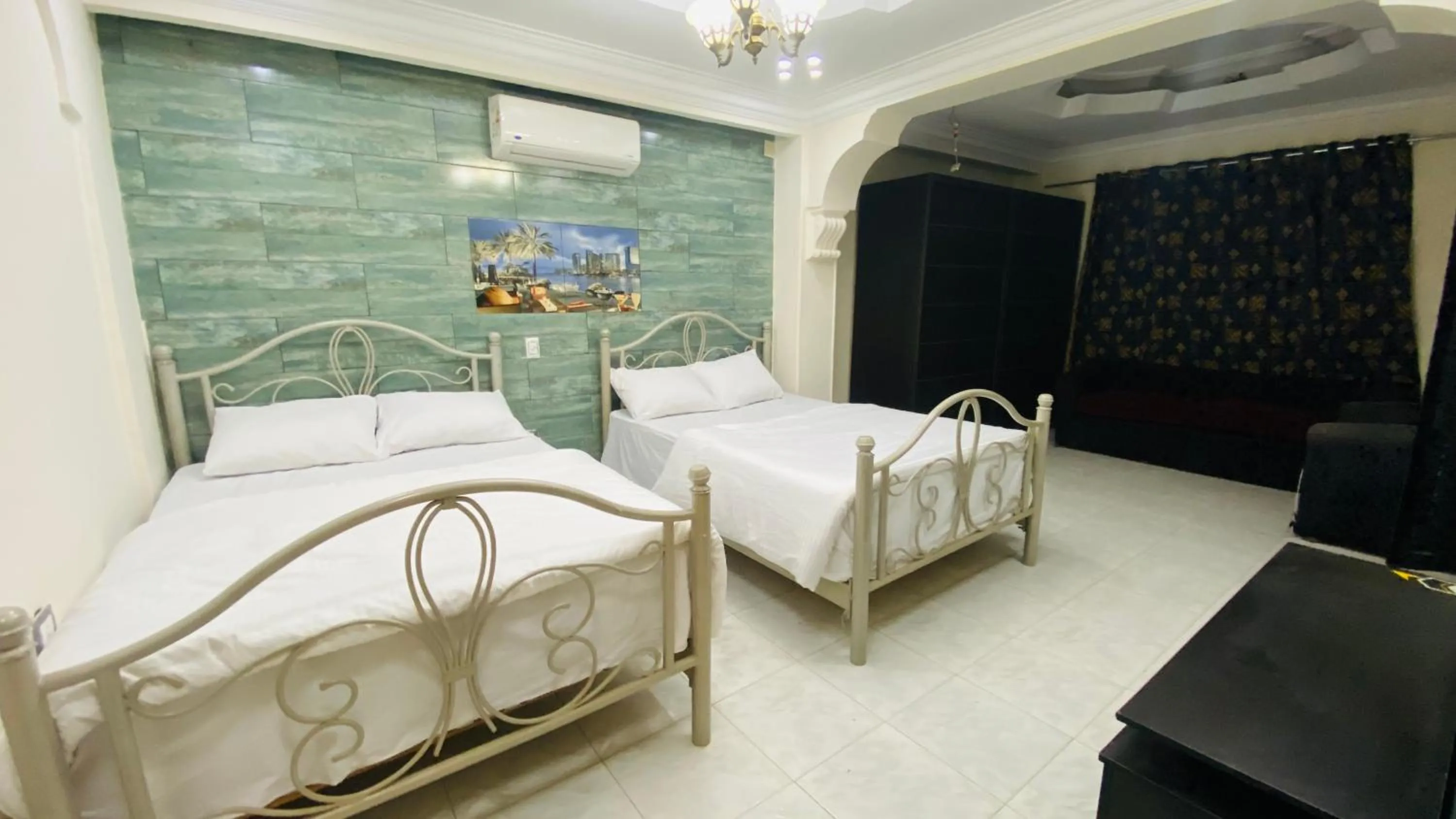 Photo of the whole room, Bed in Triangle Pyramids Boutique