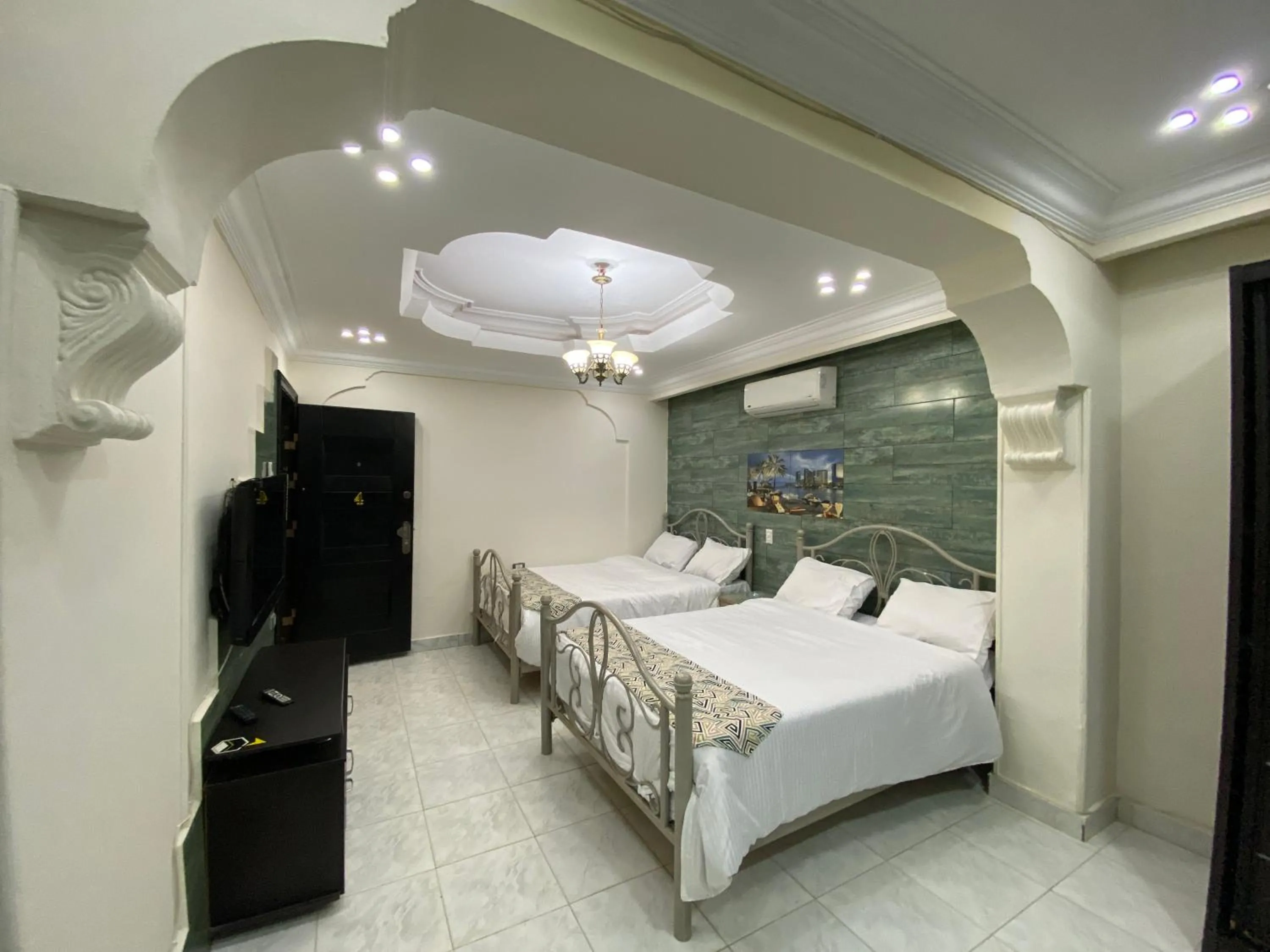 Photo of the whole room, Bed in Triangle Pyramids Boutique
