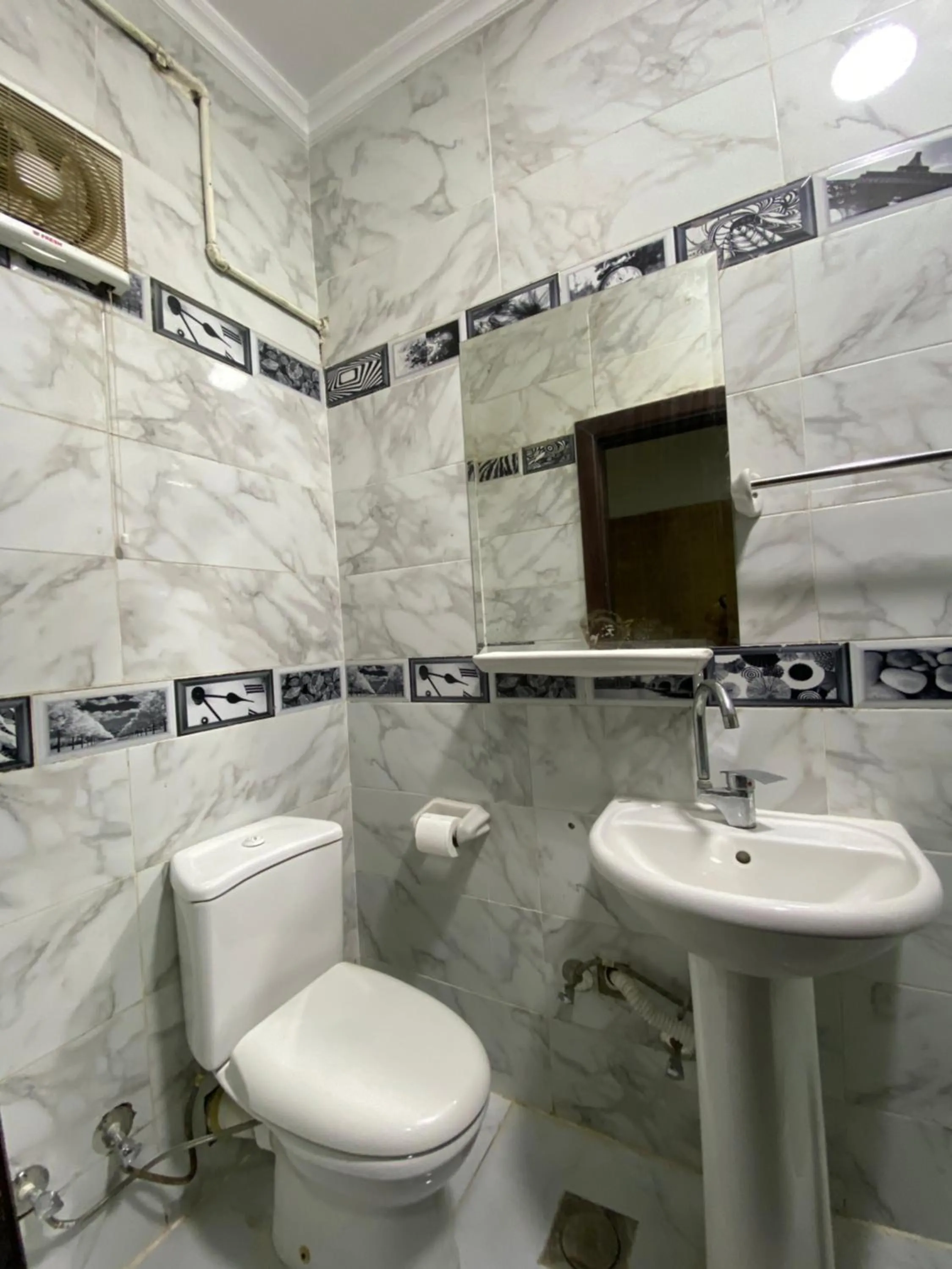 Shower in Triangle Pyramids Boutique