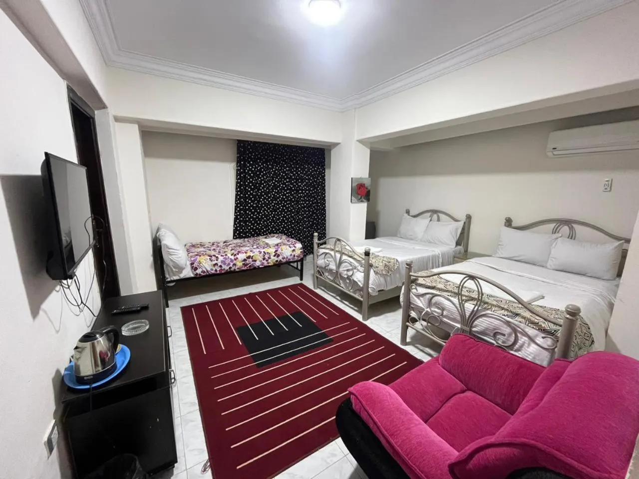 Bedroom, Bed in Triangle Pyramids Boutique