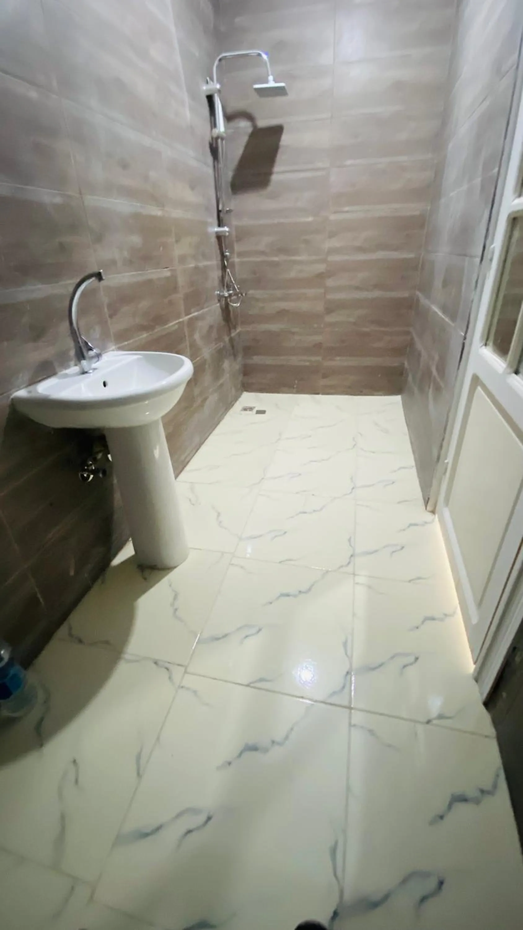 Shower in Triangle Pyramids Boutique