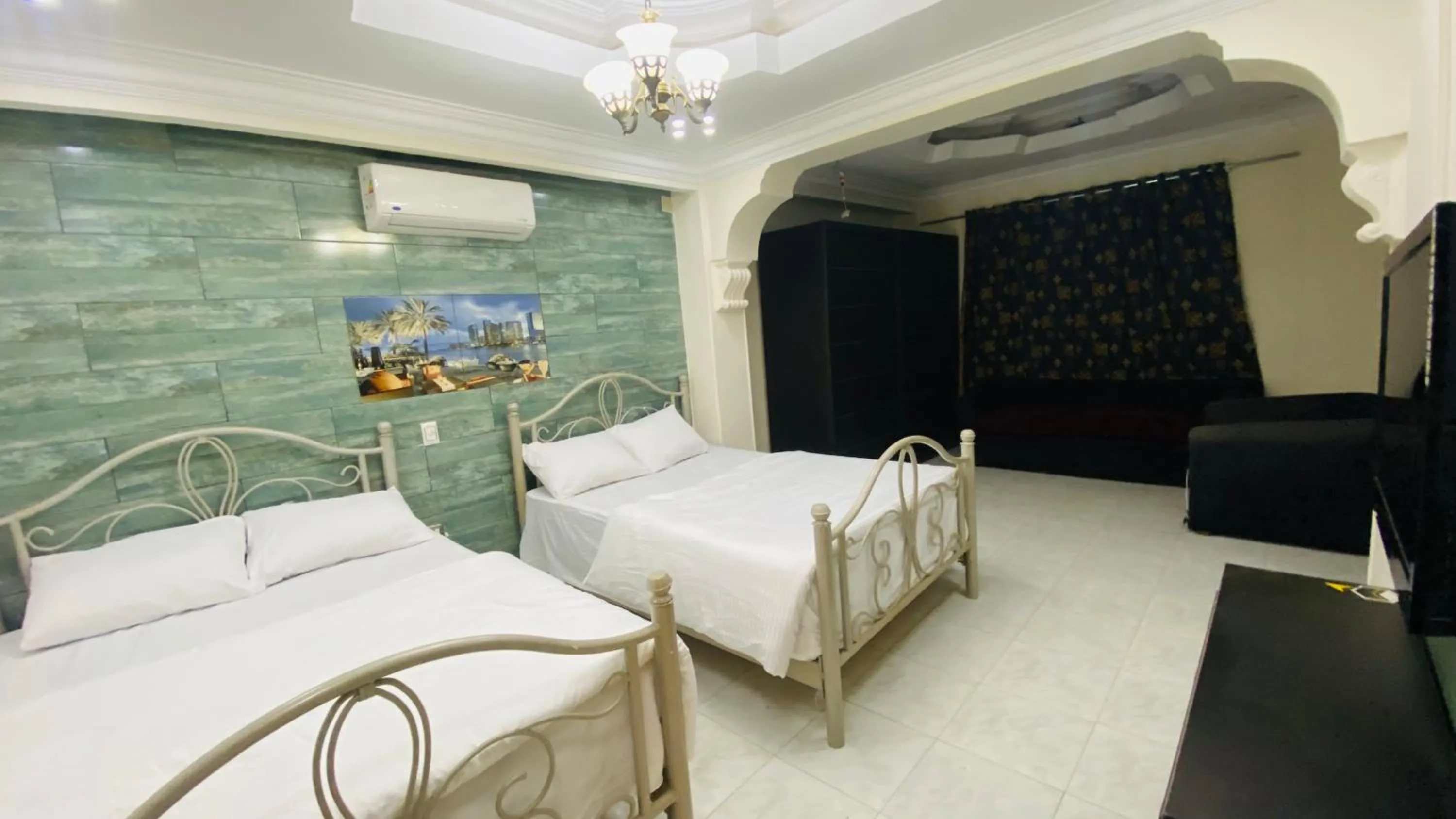 Photo of the whole room, Bed in Triangle Pyramids Boutique