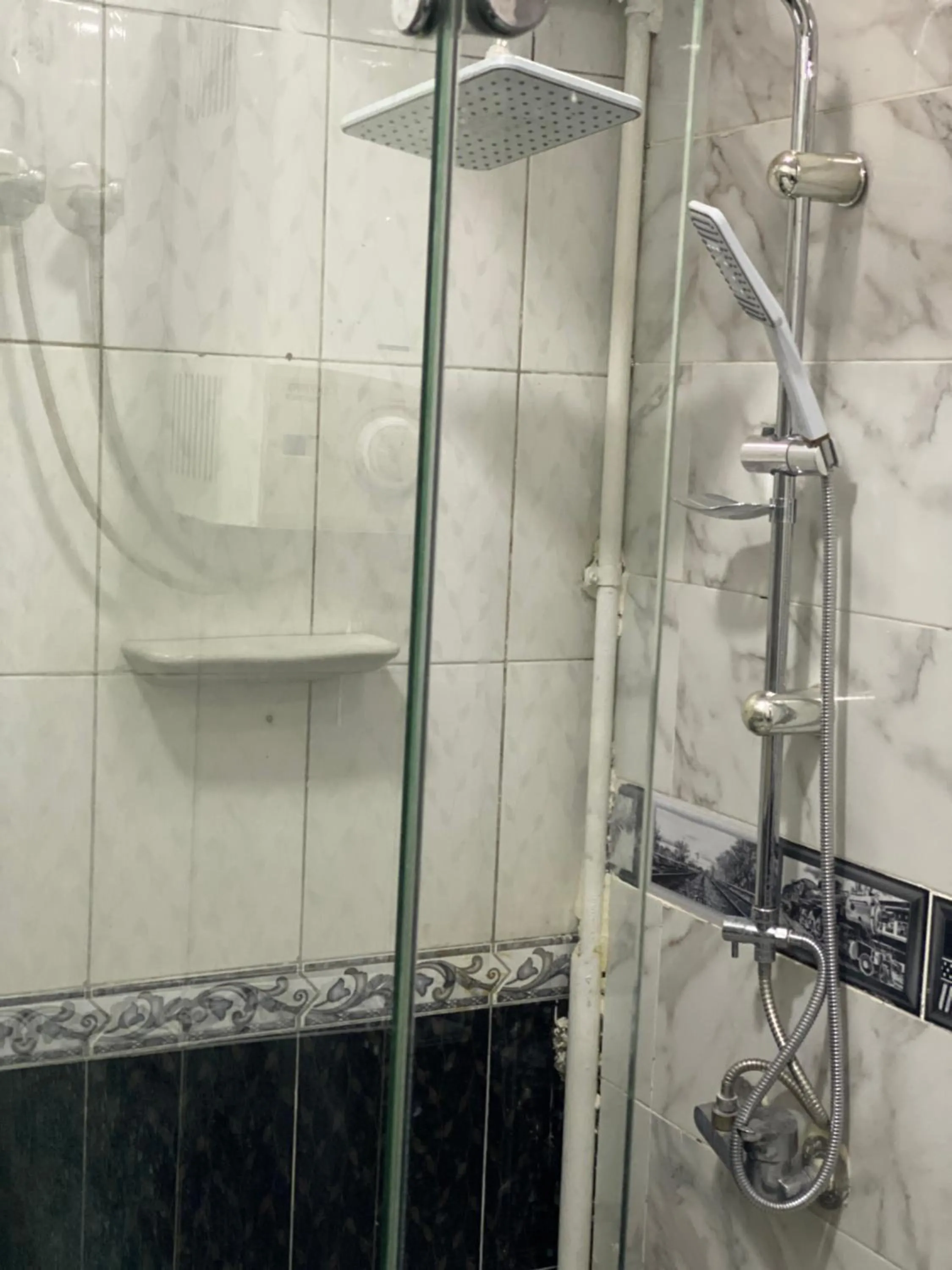 Shower in Triangle Pyramids Boutique