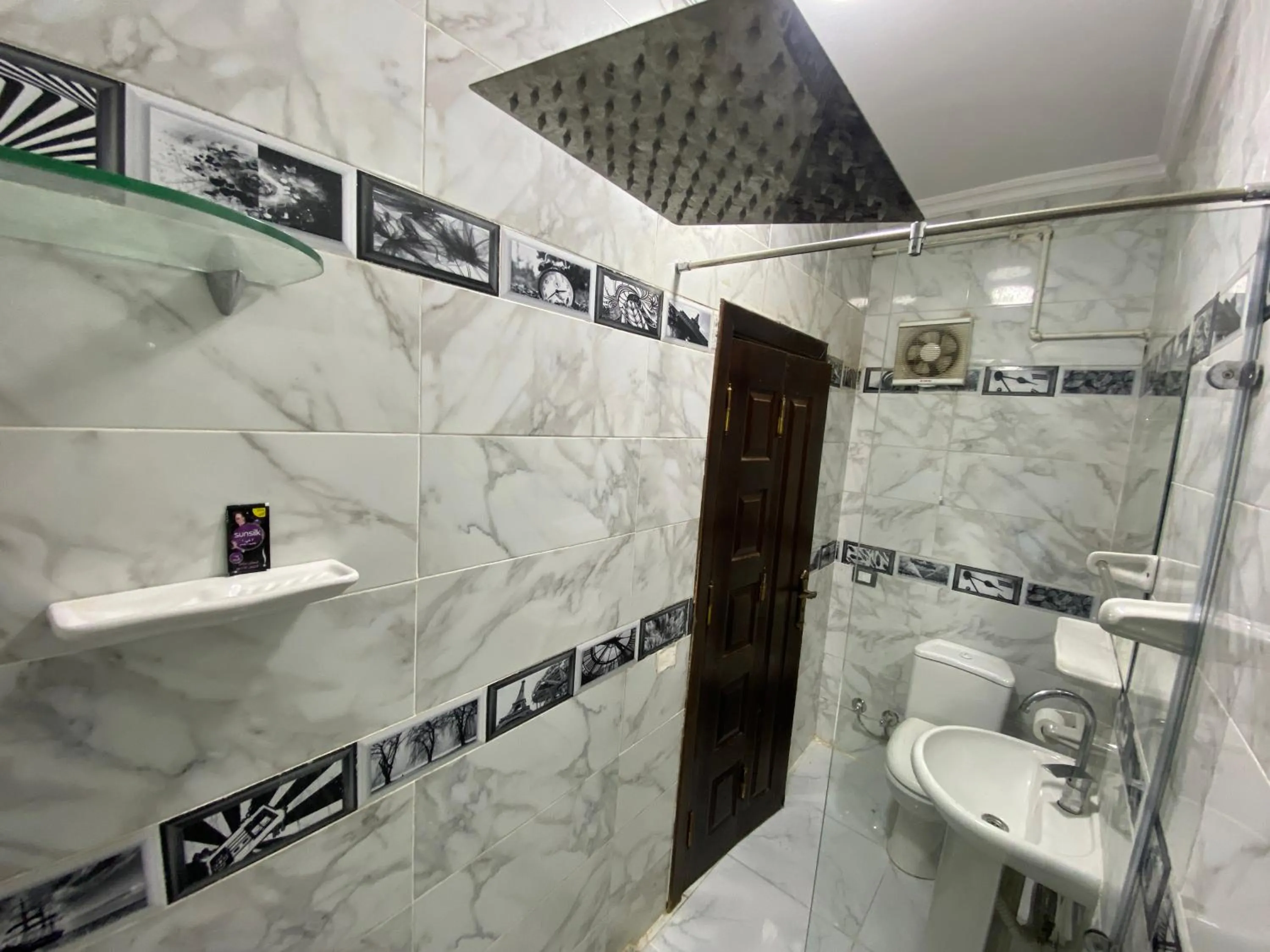 Shower in Triangle Pyramids Boutique