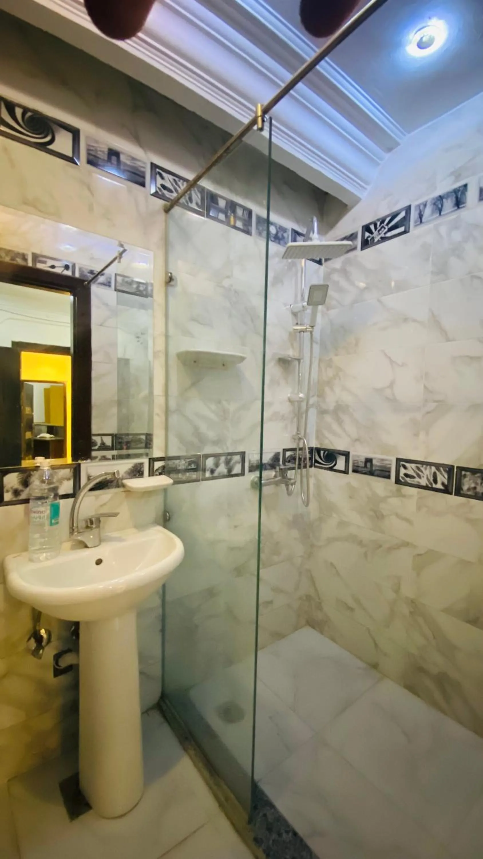 Shower in Triangle Pyramids Boutique