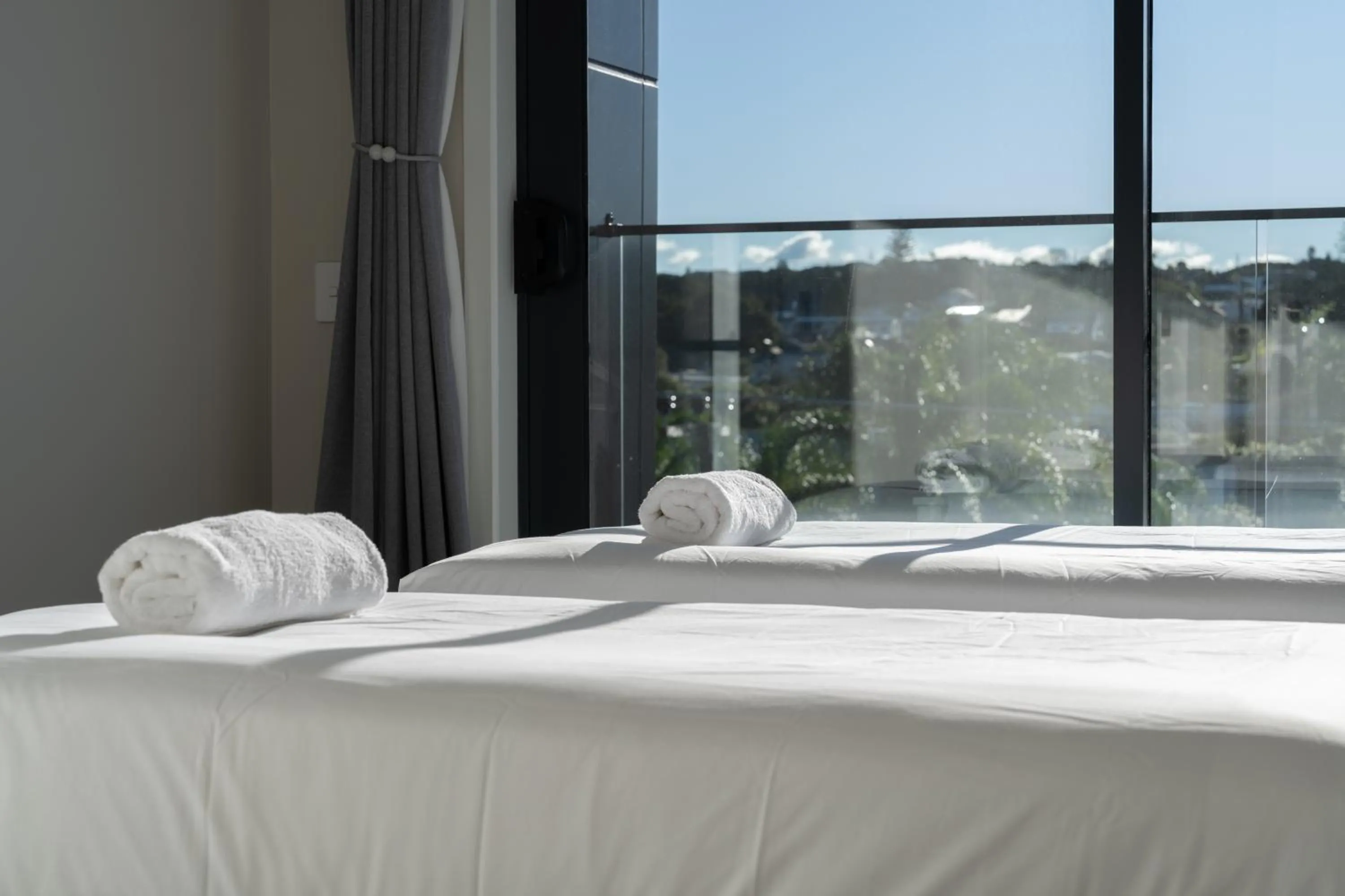 Bed in Palm Suites - Auckland