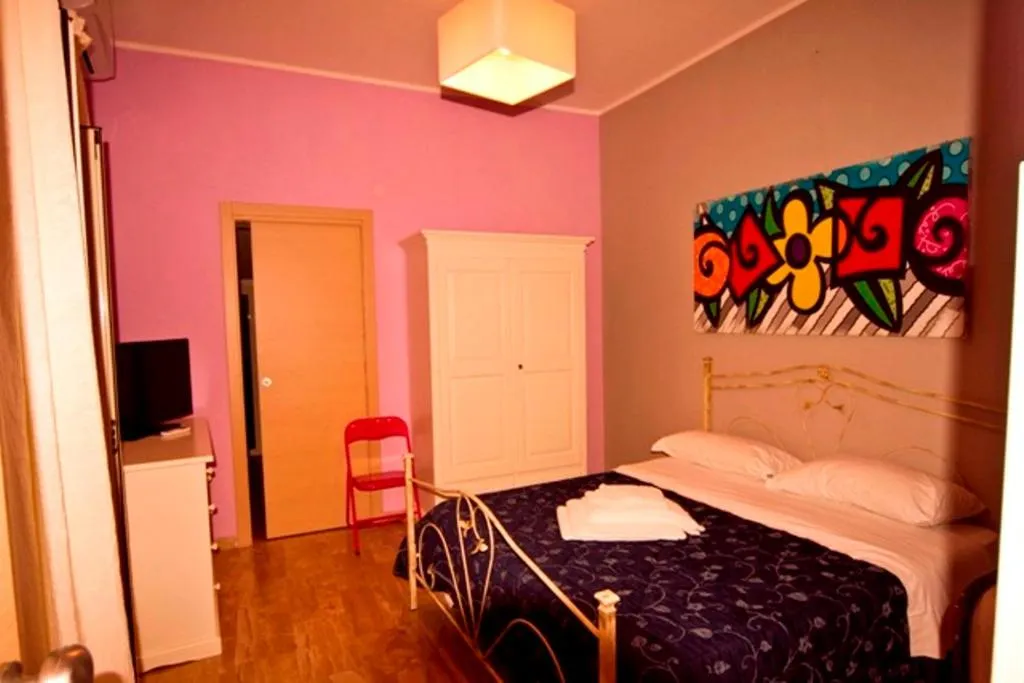 Photo of the whole room, Bed in La Marinella