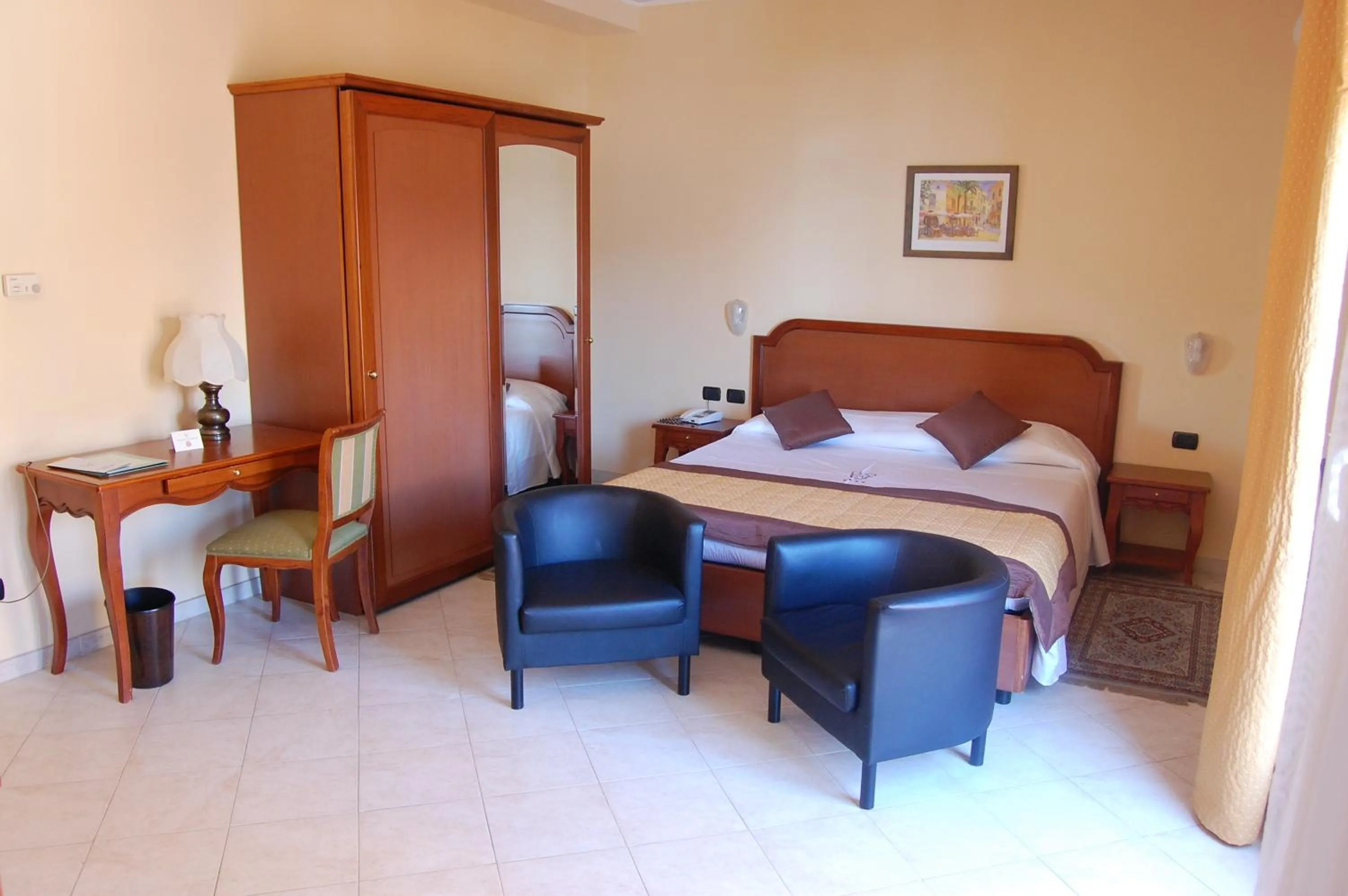 Photo of the whole room, Bed in Grand Hotel Moroni