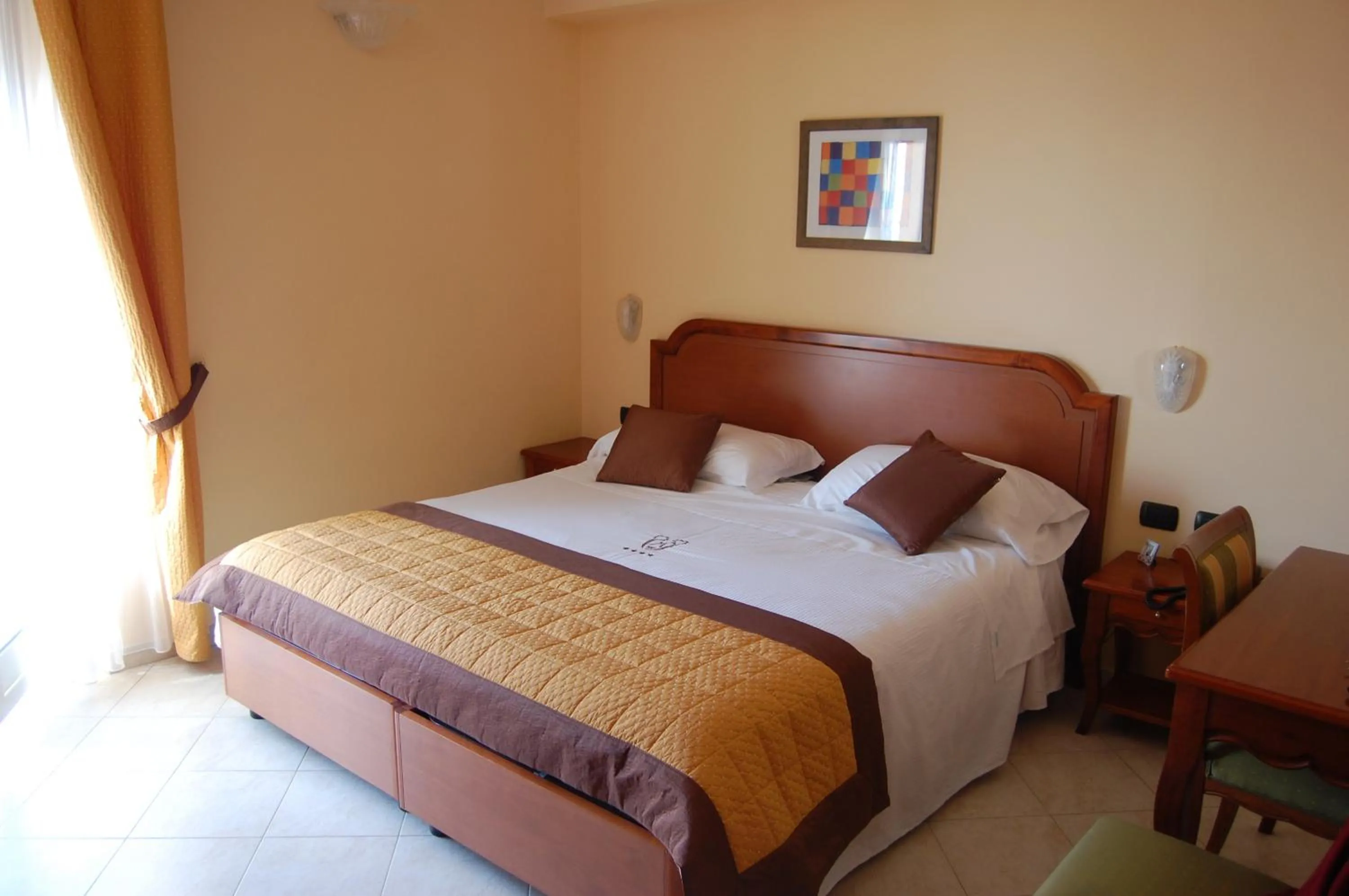 Bed in Grand Hotel Moroni