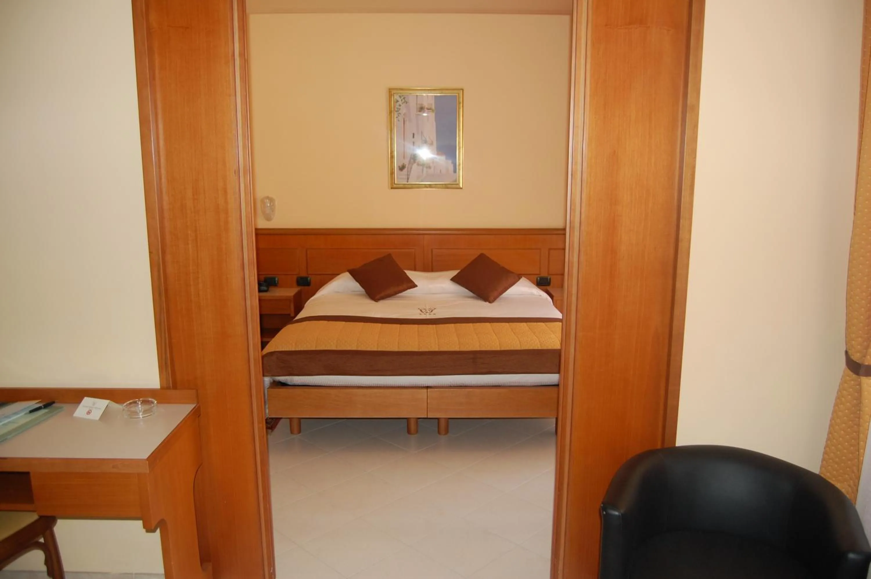 Photo of the whole room, Bed in Grand Hotel Moroni
