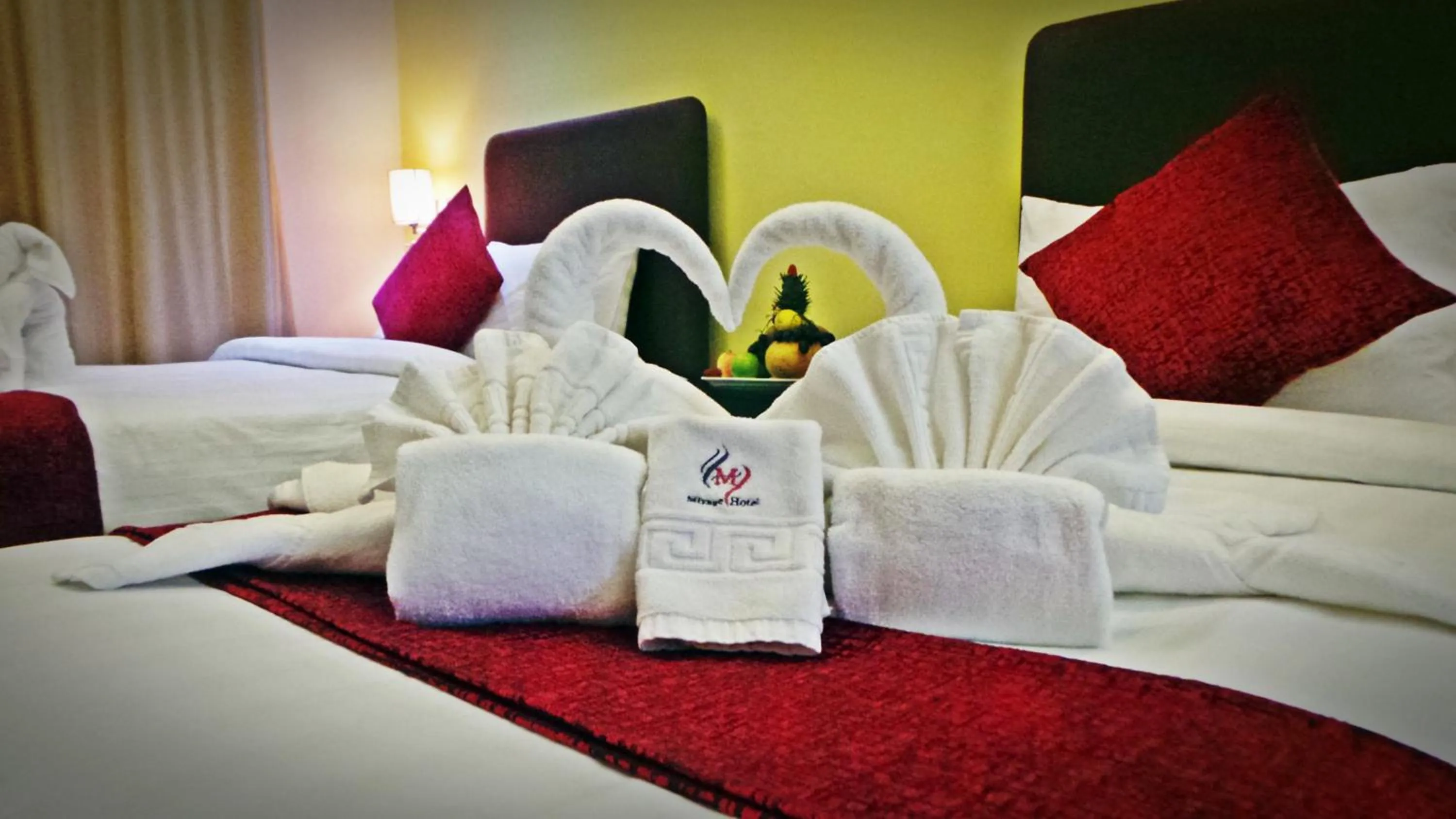 Bed in Mirage Hotel Al Aqah