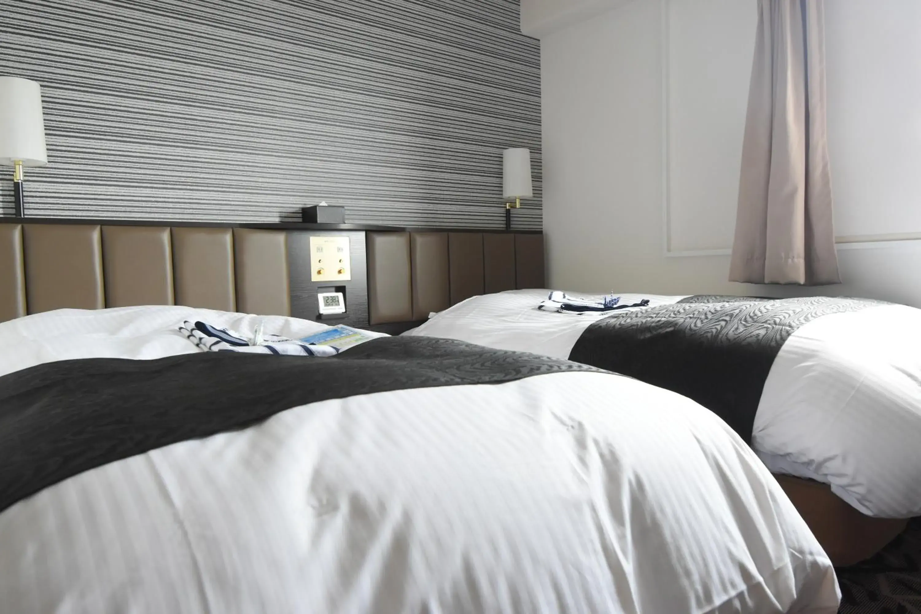 Bed in APA Hotel Miyazaki Miyakonojo Ekimae Bed in APA Hotel Miyazaki Miyakonojo Ekimae