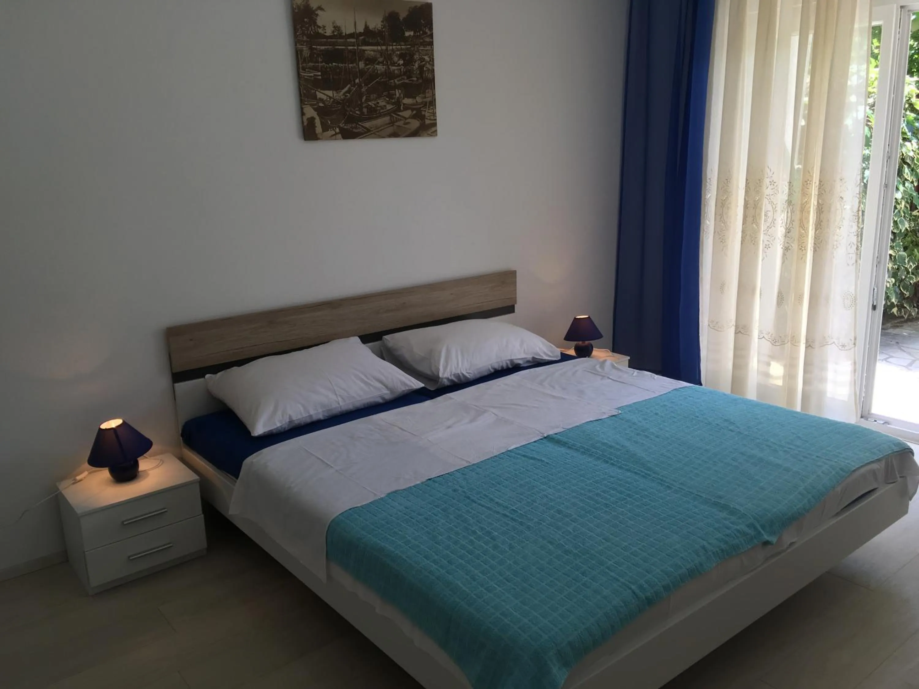 Bed in Apartments Paco & Bony