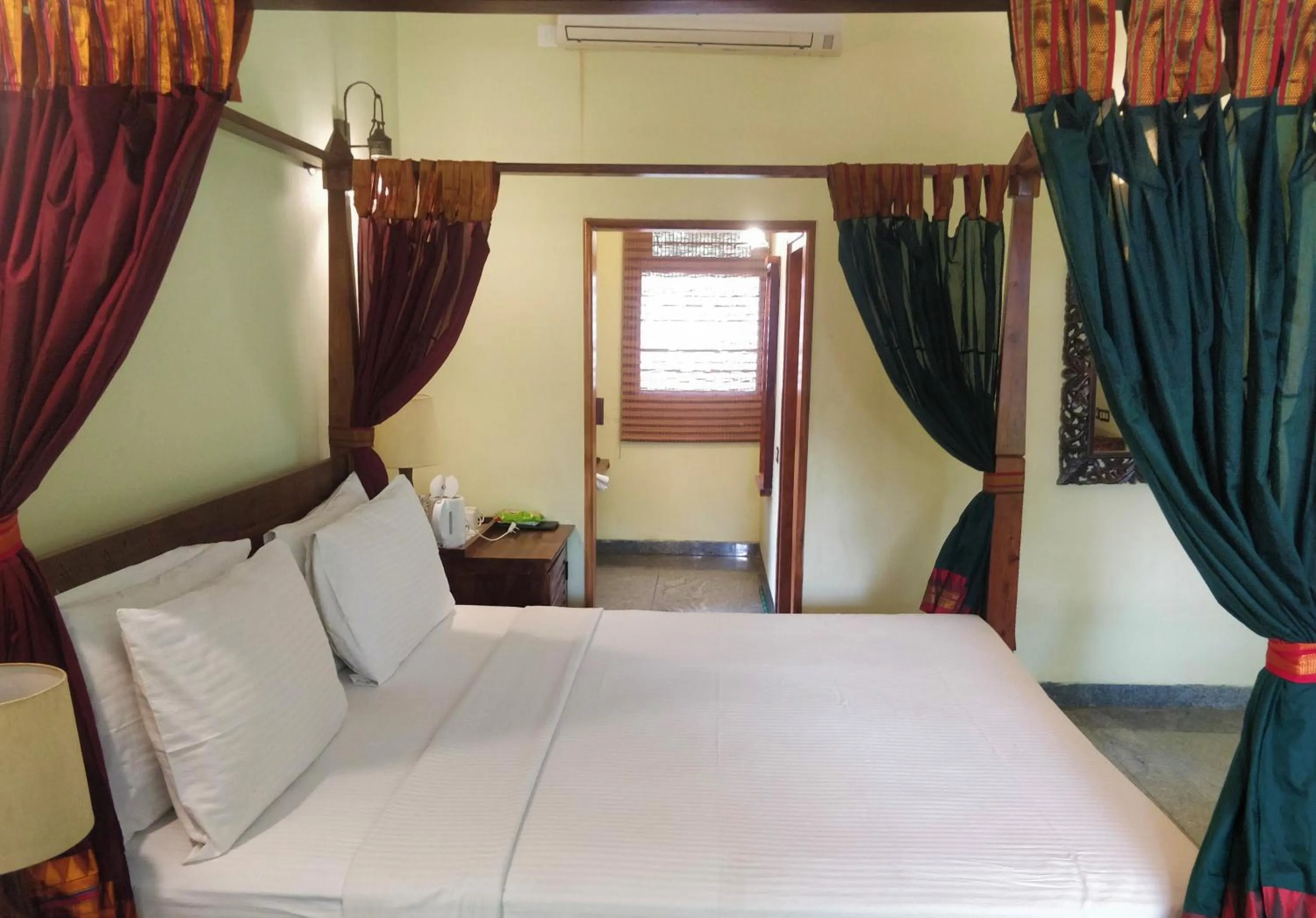 Bed in Heritage Resort Hampi