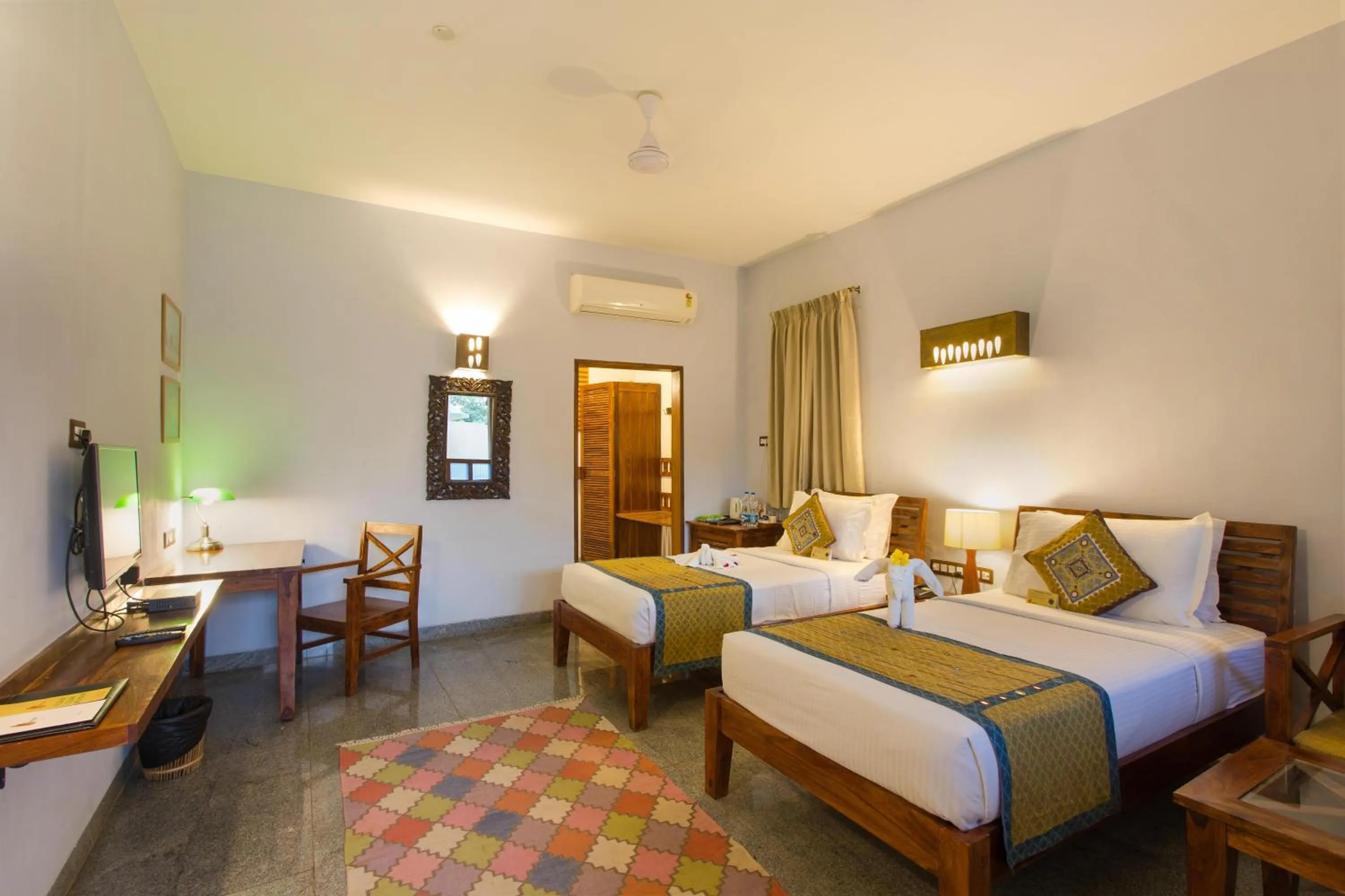 Bed in Heritage Resort Hampi