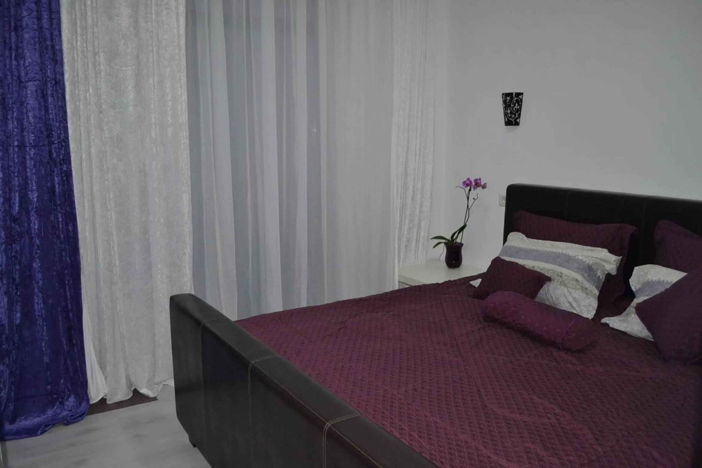 Bed in City Park Residence