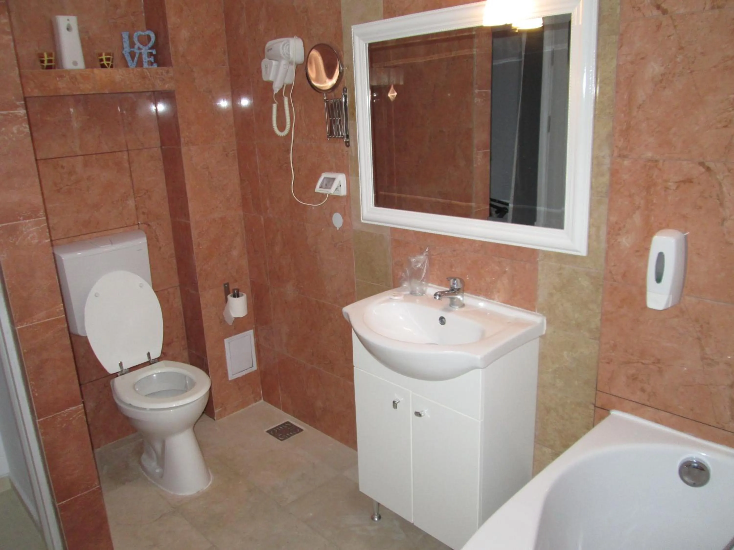 Toilet in City Park Residence