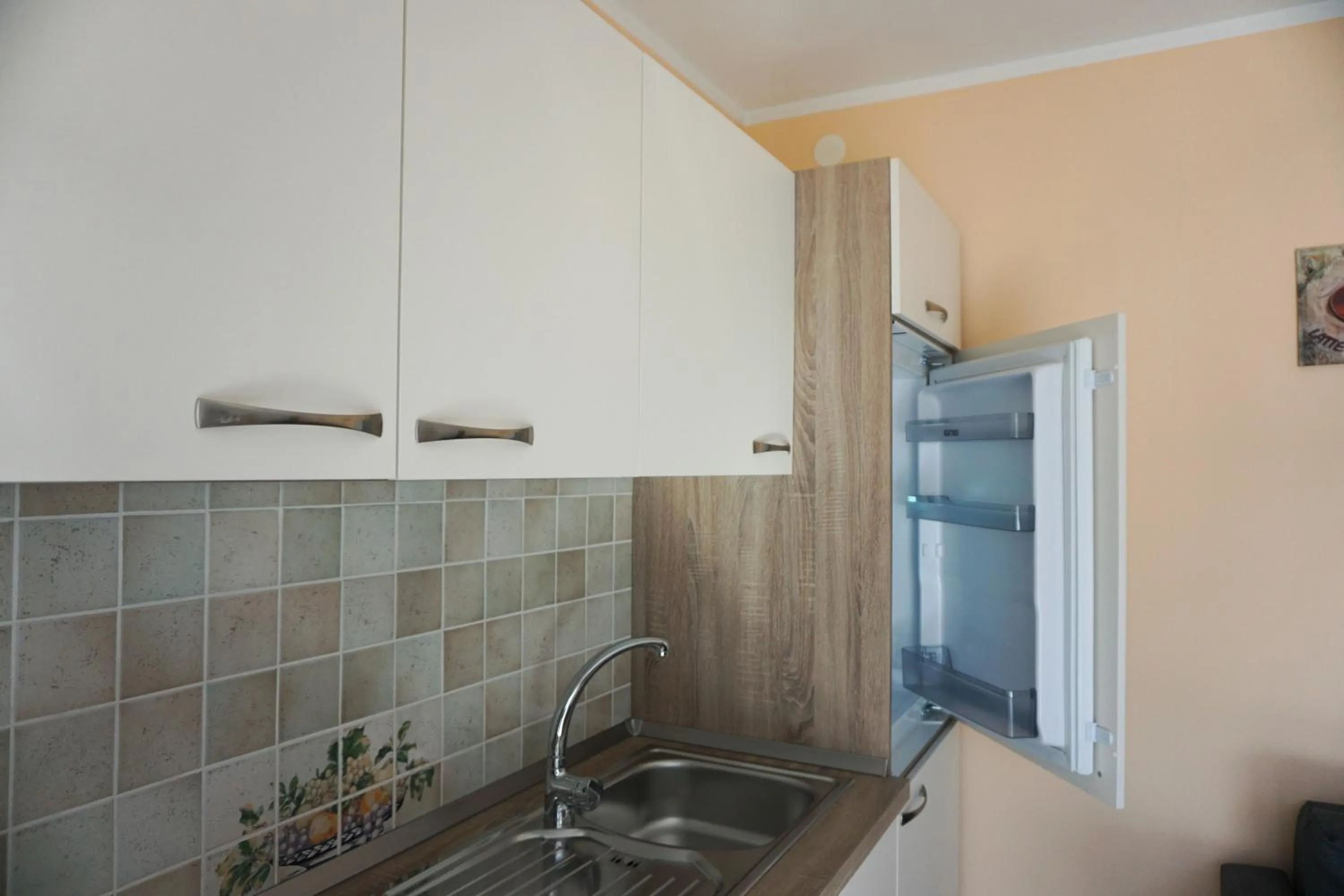 Kitchen or kitchenette in Apartments Kravanja
