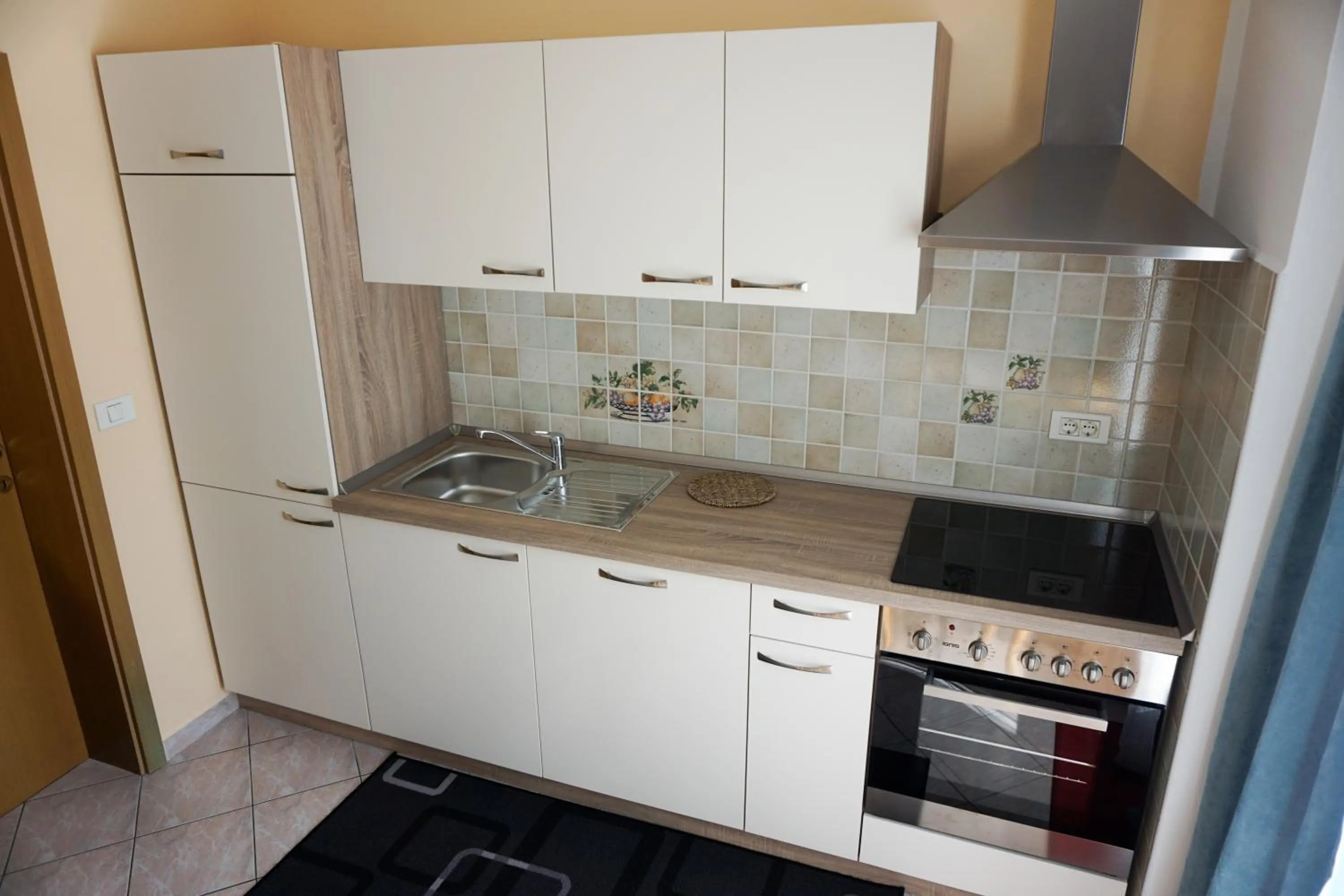Kitchen or kitchenette in Apartments Kravanja