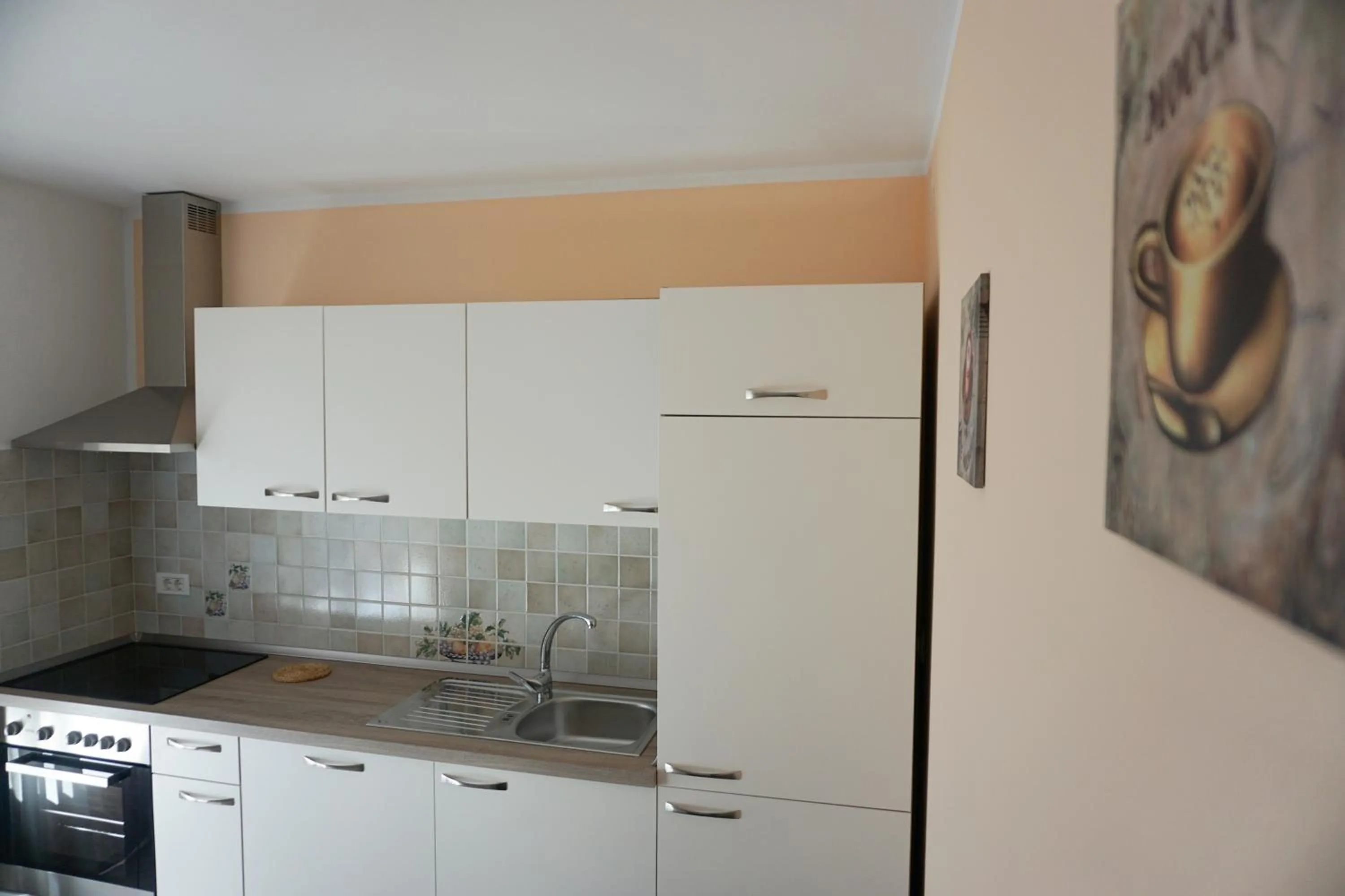 Kitchen or kitchenette in Apartments Kravanja
