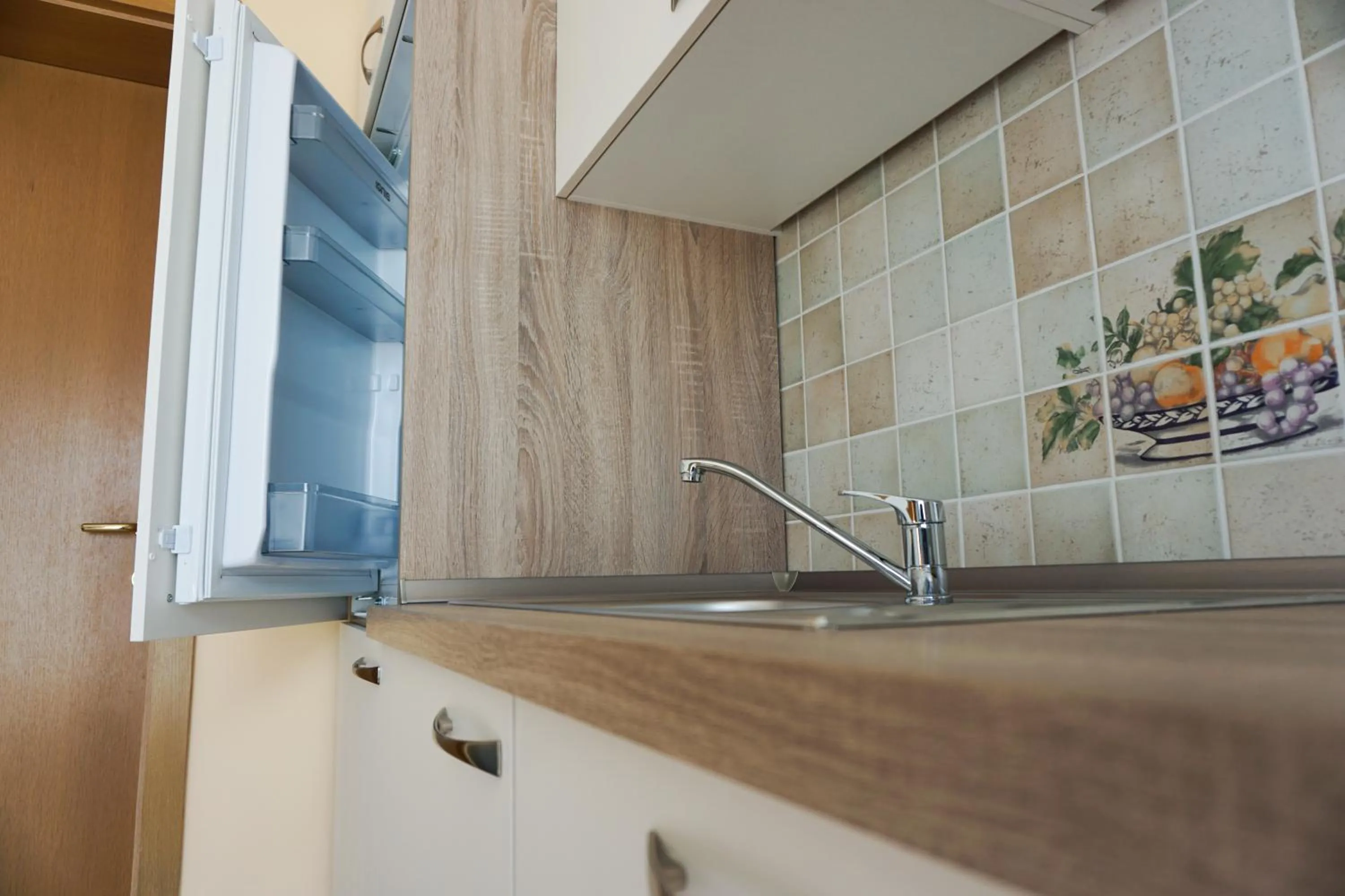 Kitchen or kitchenette in Apartments Kravanja