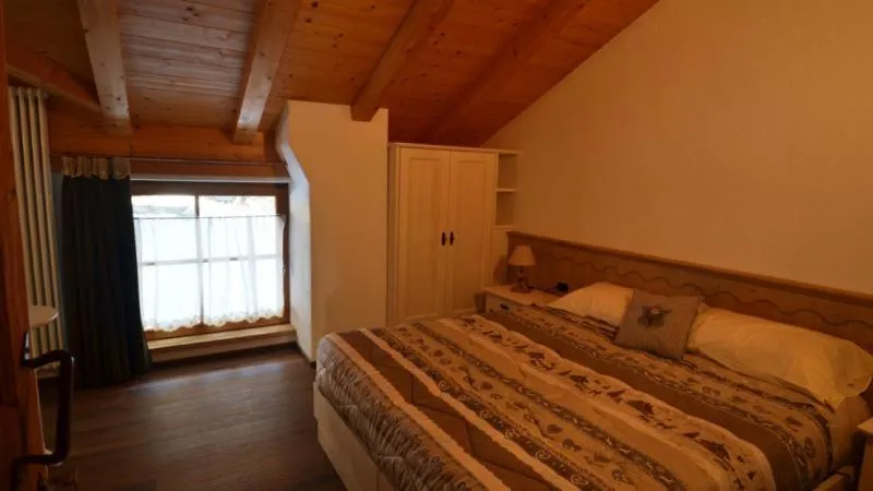 Bed in Rifugio Lo Scoiattolo