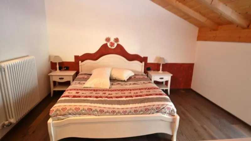 Bed in Rifugio Lo Scoiattolo