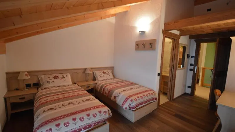 Bed in Rifugio Lo Scoiattolo