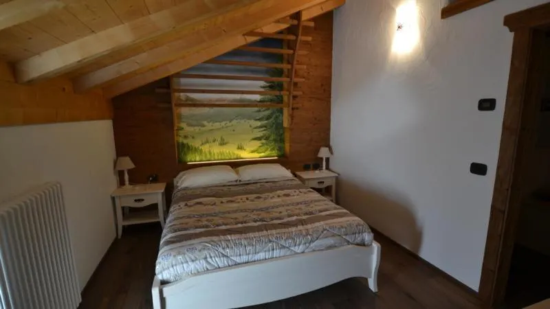 Bed in Rifugio Lo Scoiattolo