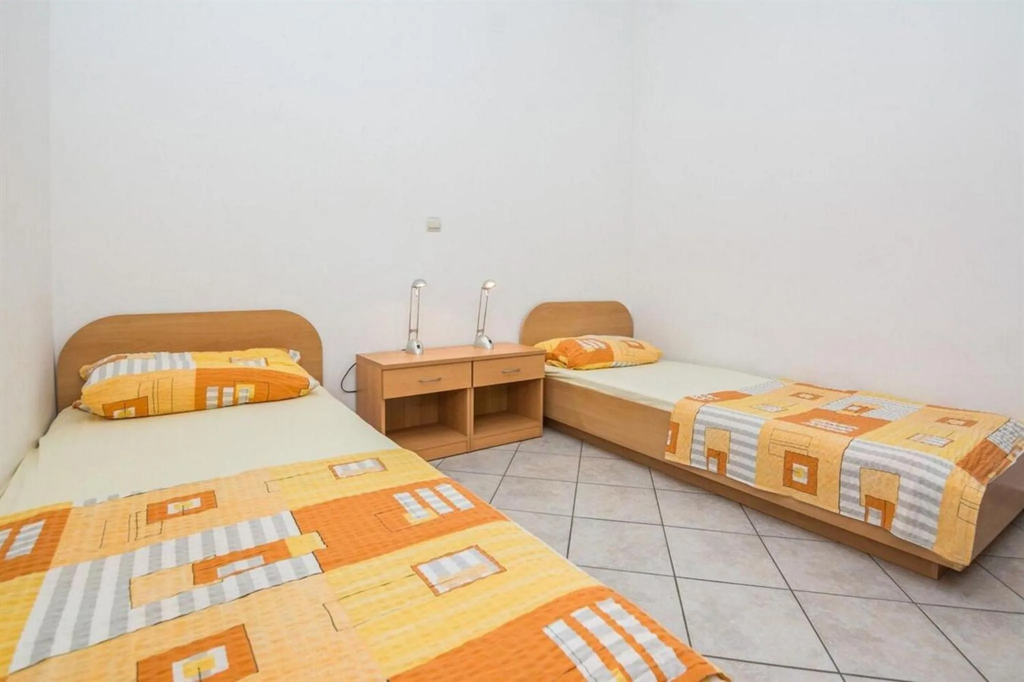 Bed in Apartments Delic-Pejic