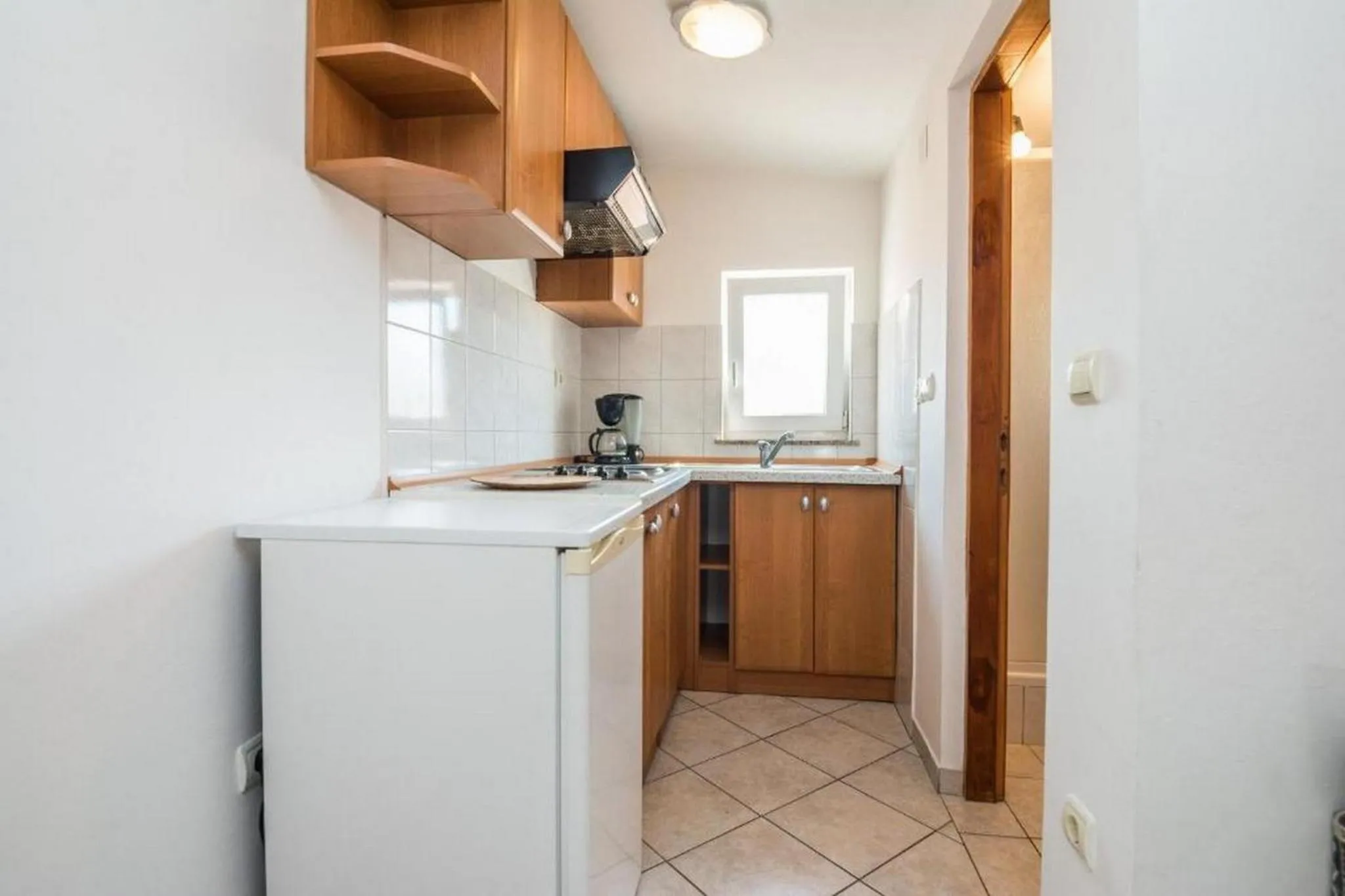 Kitchen or kitchenette in Apartments Delic-Pejic