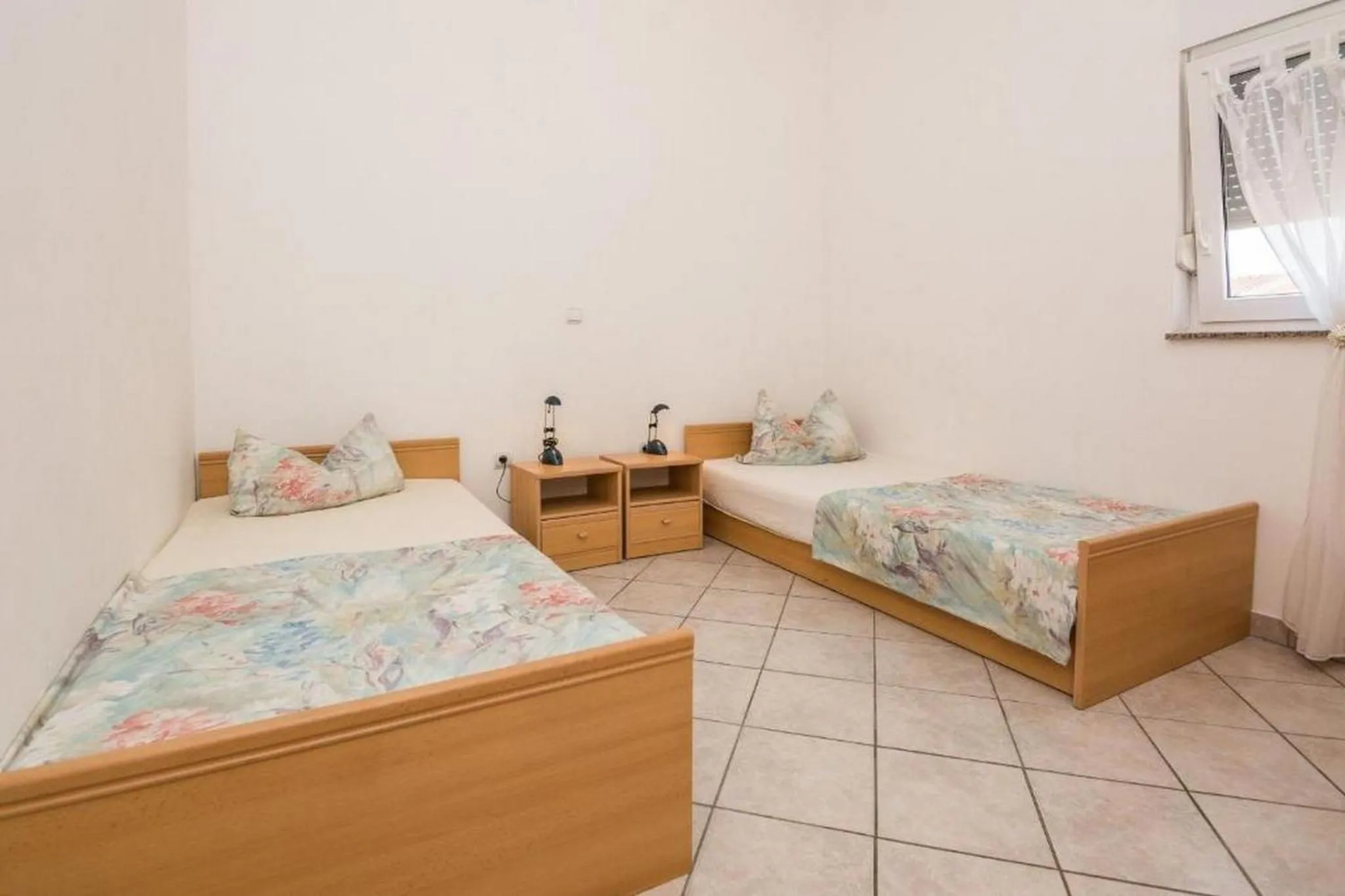 Bed in Apartments Delic-Pejic