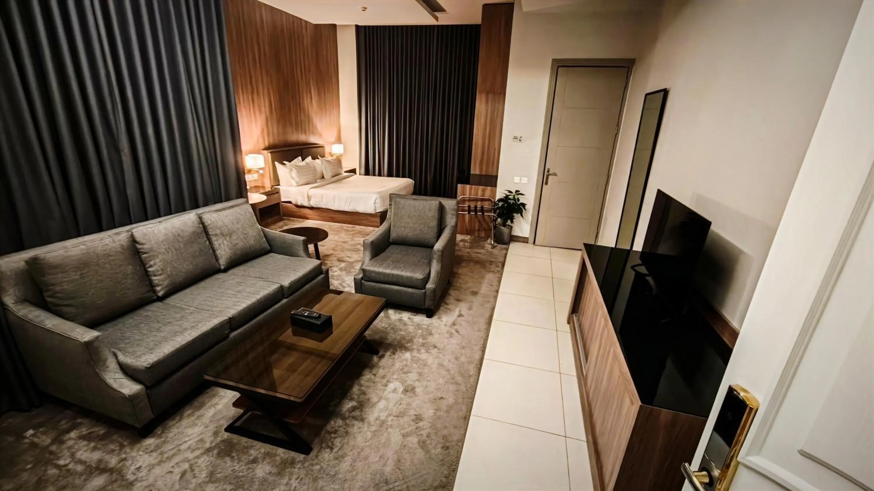 Communal lounge/ TV room in Land Walk Al Aqiq